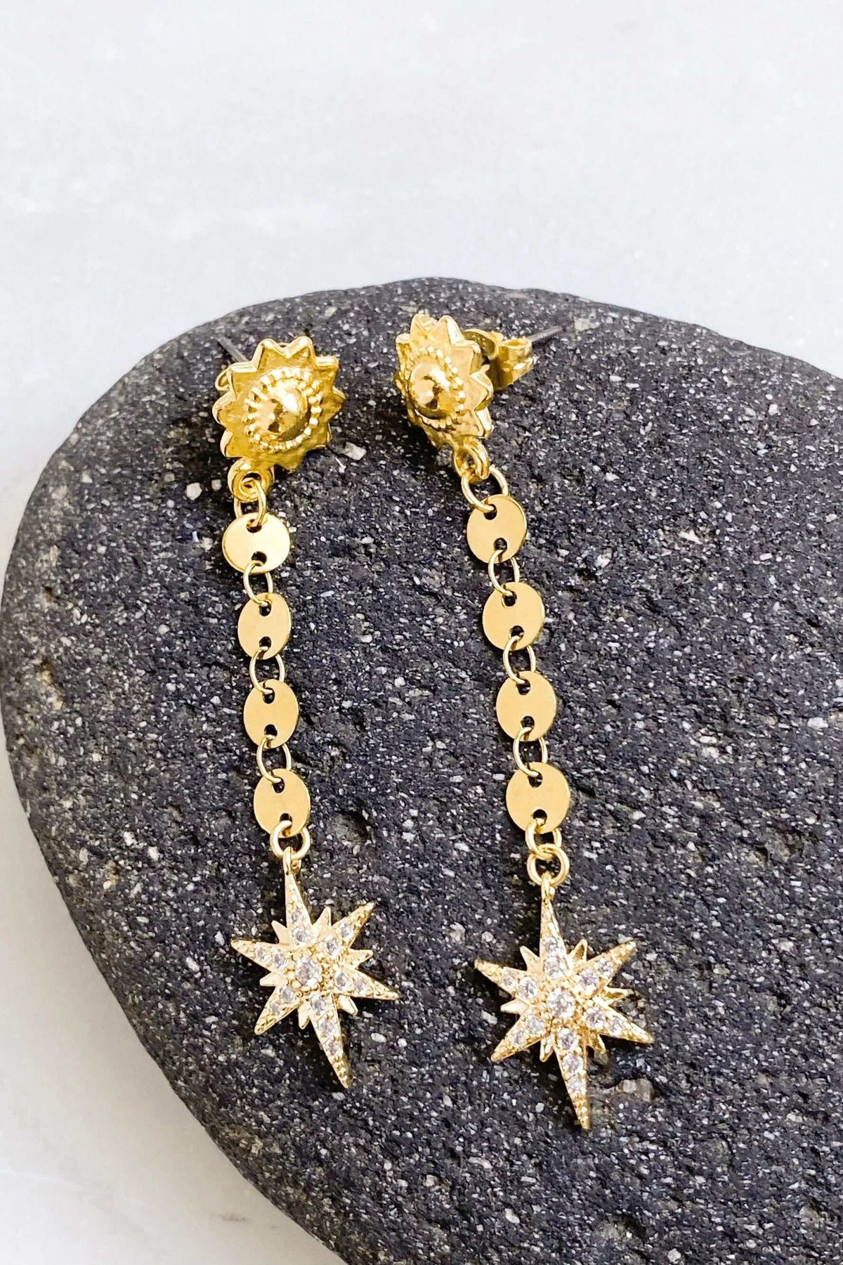 ESTRADE Earrings in gold-tone metal with decorative stud tops, linked discs and sparkling starburst pendants