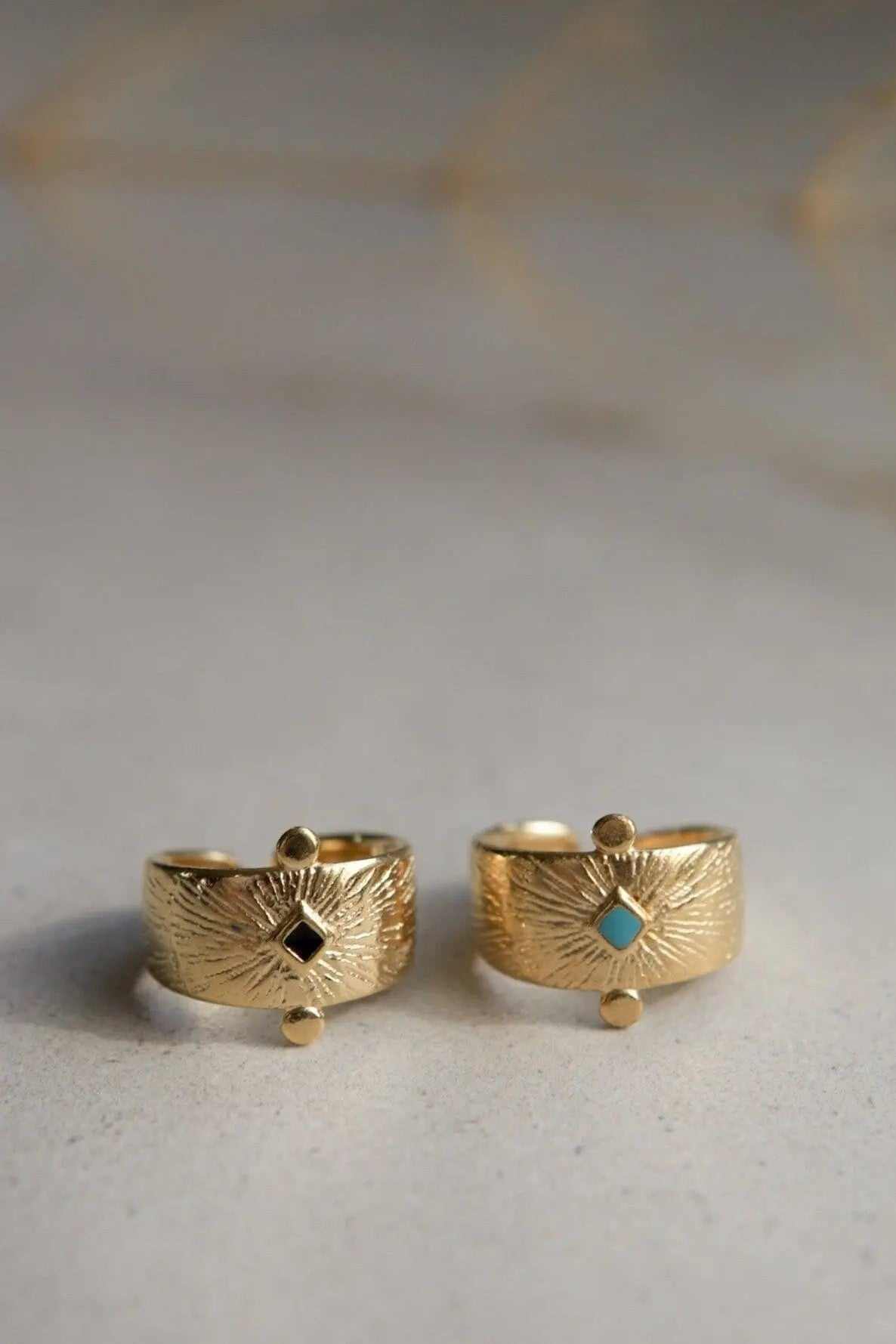 Ethnic Ancient Greek RING in gold-tone metal with engraved sunburst texture and small black and turquoise stones