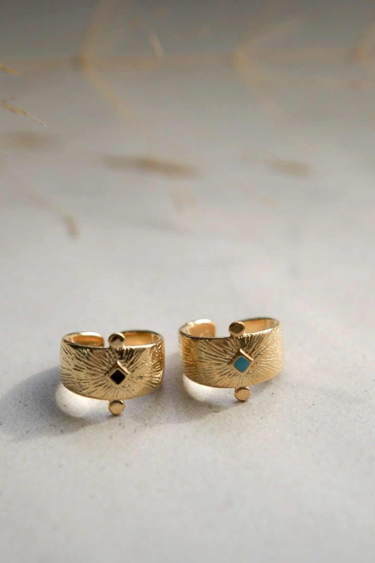 Ethnic Ancient Greek RING in textured gold-tone metal, with an adjustable open band and small square black and turquoise stones