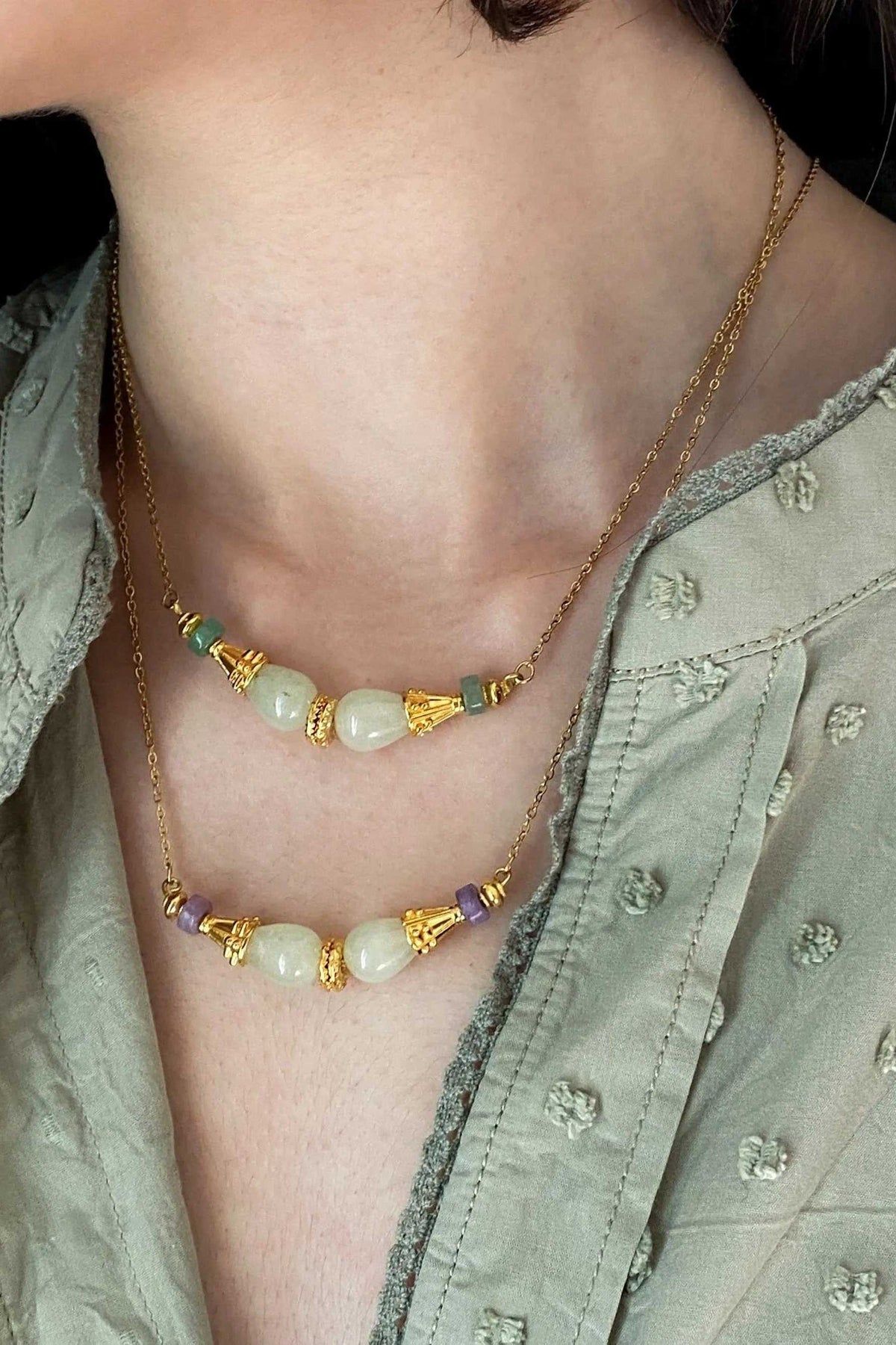 EUPHORIA Gemstone Necklace with gold-tone chain, pale yellow stones, green and purple accents, and gold spacers