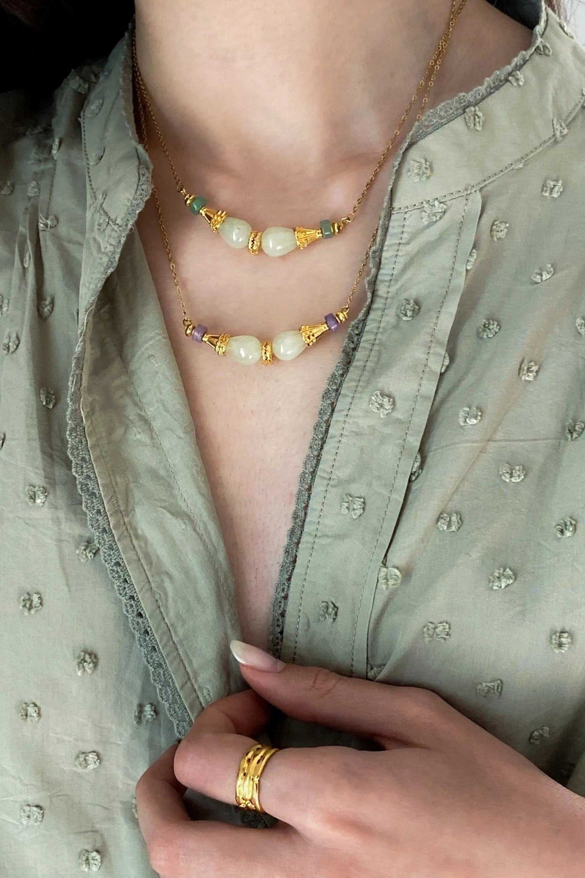 EUPHORIA Gemstone Necklace with gold-tone chain and white gemstone beads, featuring delicate boho detailing
