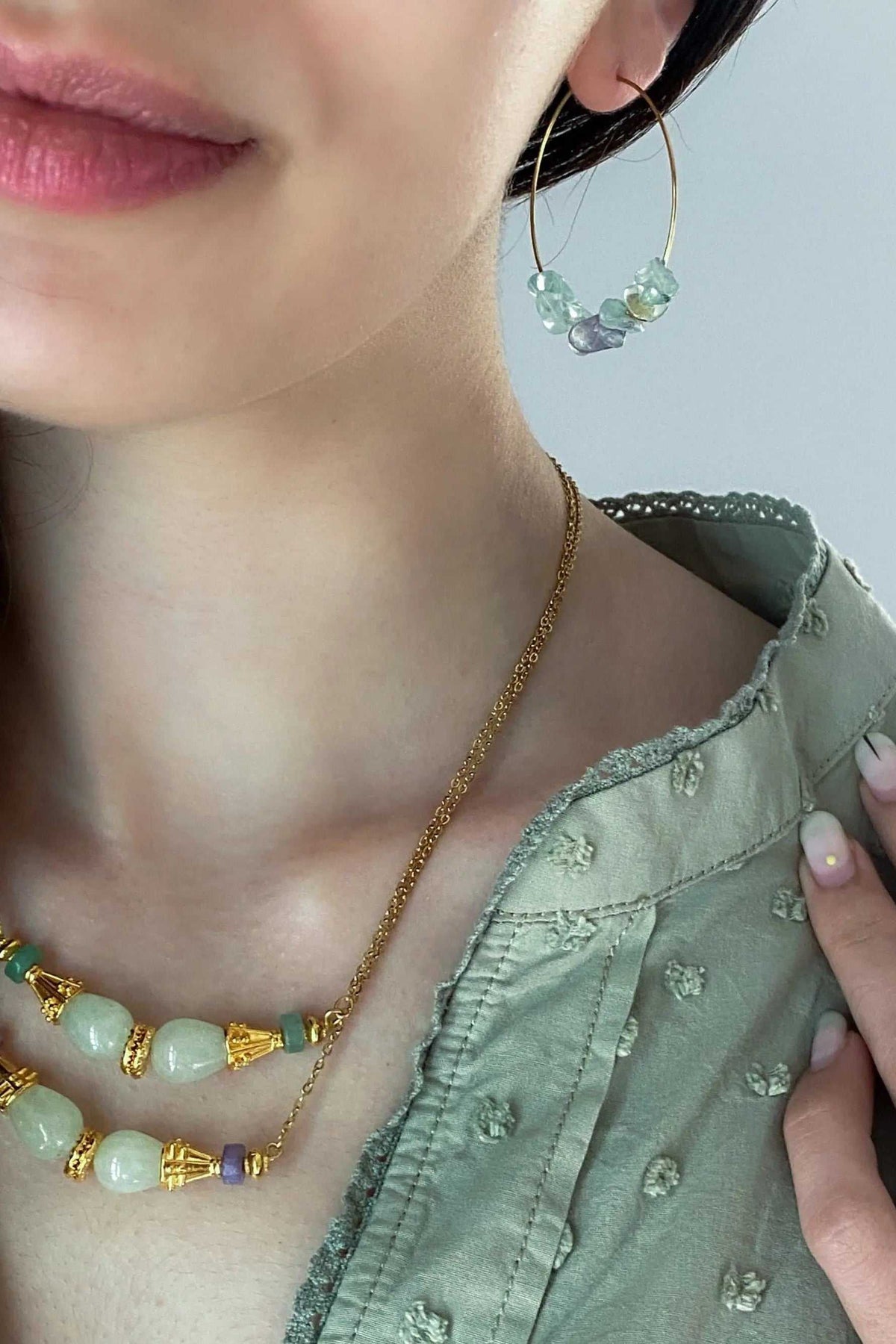 EUPHORIA Gemstone Necklace with gold-tone chain and green gemstone beads, featuring a long boho pendant