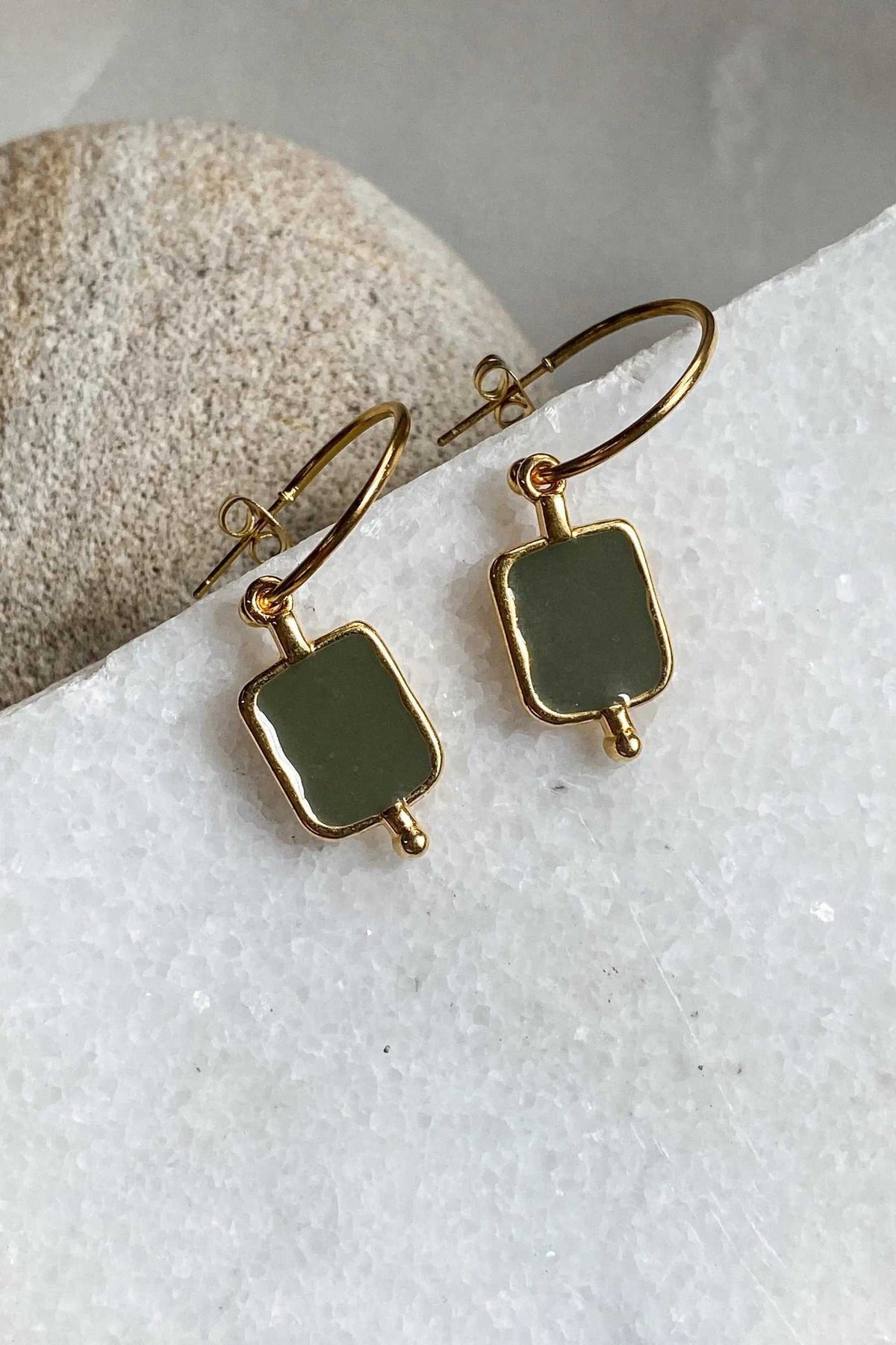 Gold Chain bracelet with gold-tone hooks and dark green rectangular charms in a smooth, polished finish