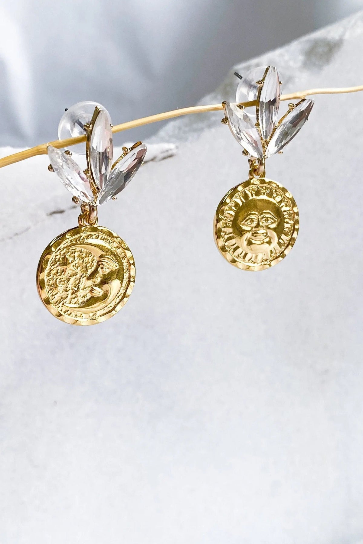 Gold Coin drop Earrings in gold-tone metal with embossed round coin charms and clear crystal leaf studs