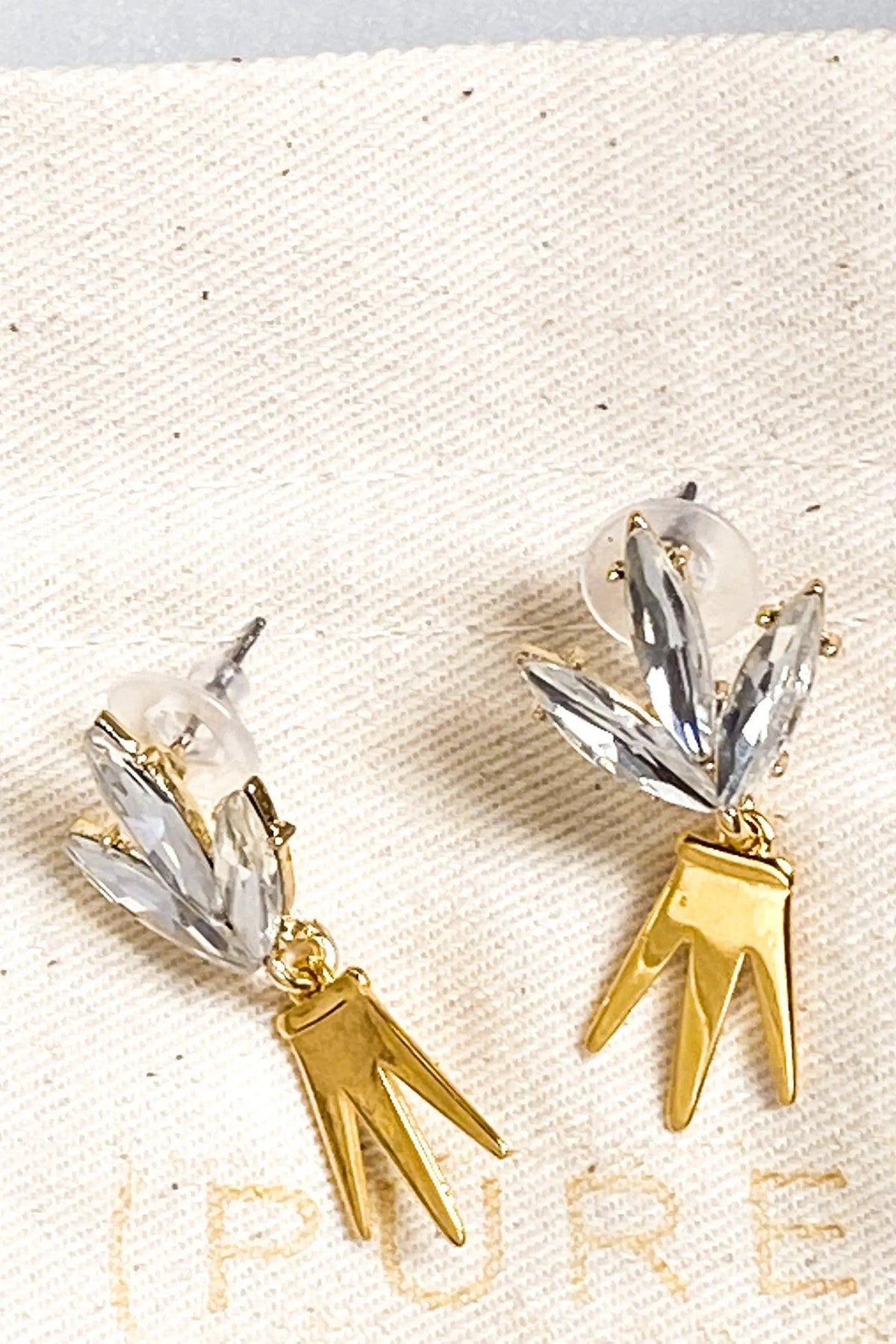 Gold Crown Earrings with gold-tone crown-shaped drops and clear faceted crystal leaf studs