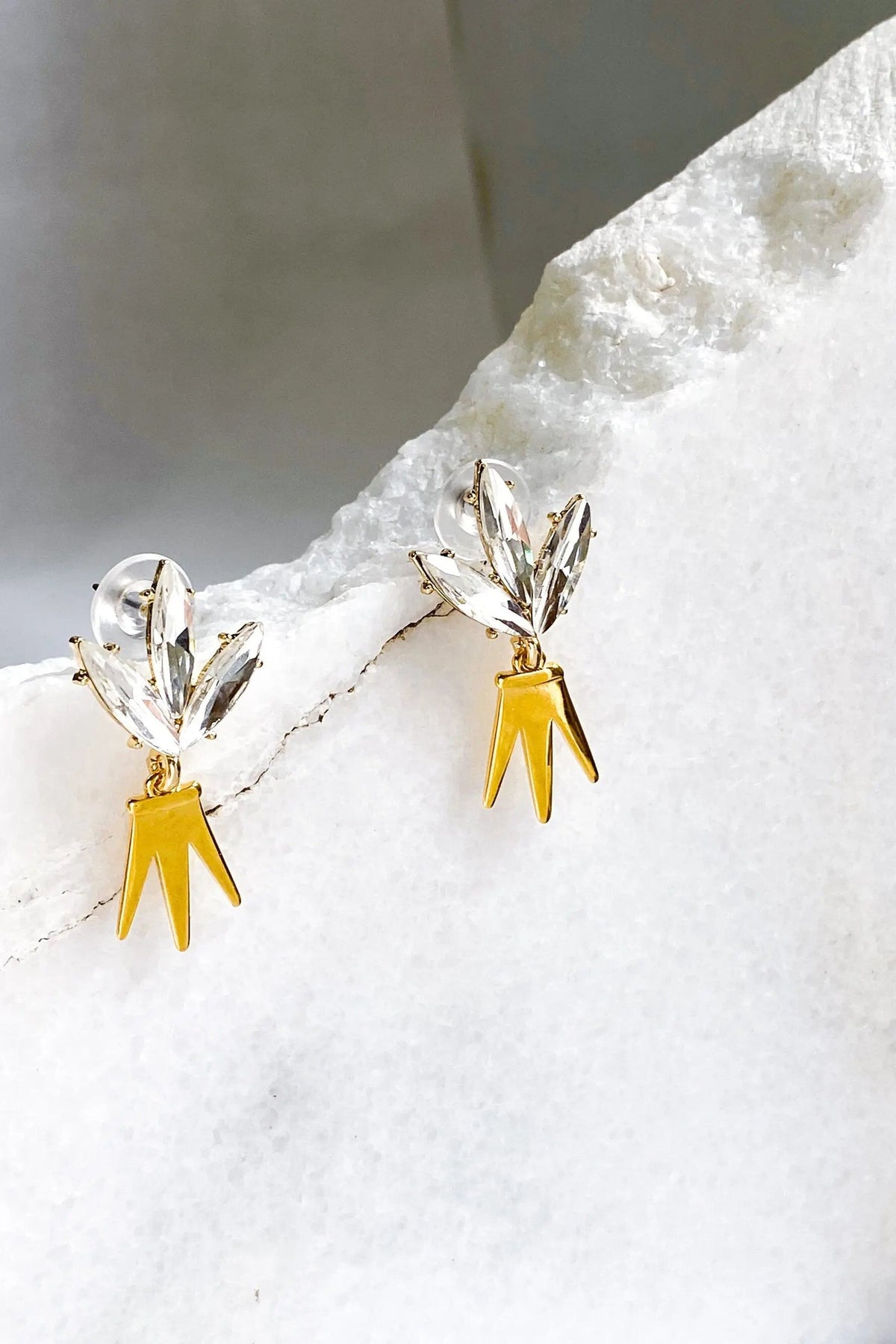 Gold Crown Earrings with polished yellow-gold geometric drops and clear crystal leaf-shaped studs