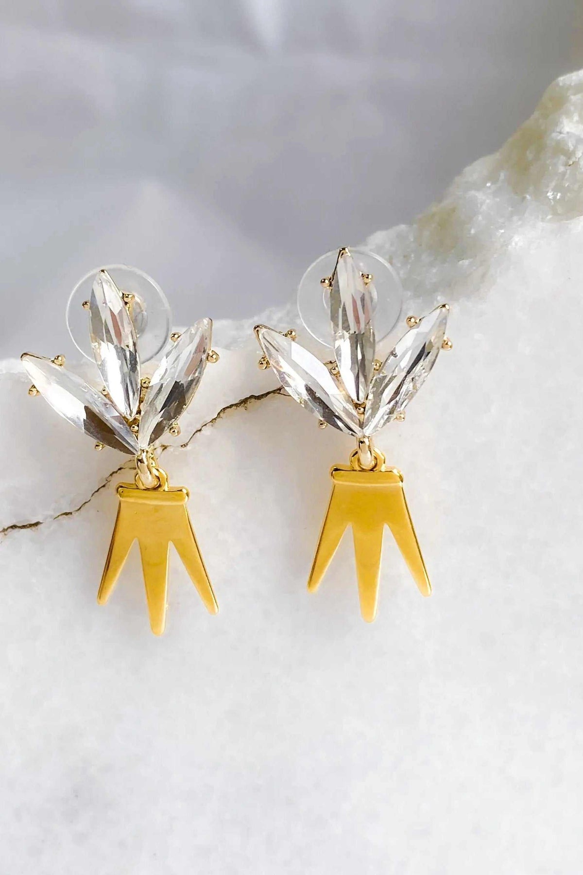 Gold Crown Earrings with gold-tone pointed crown drops and clear crystal leaf-shaped stud tops.