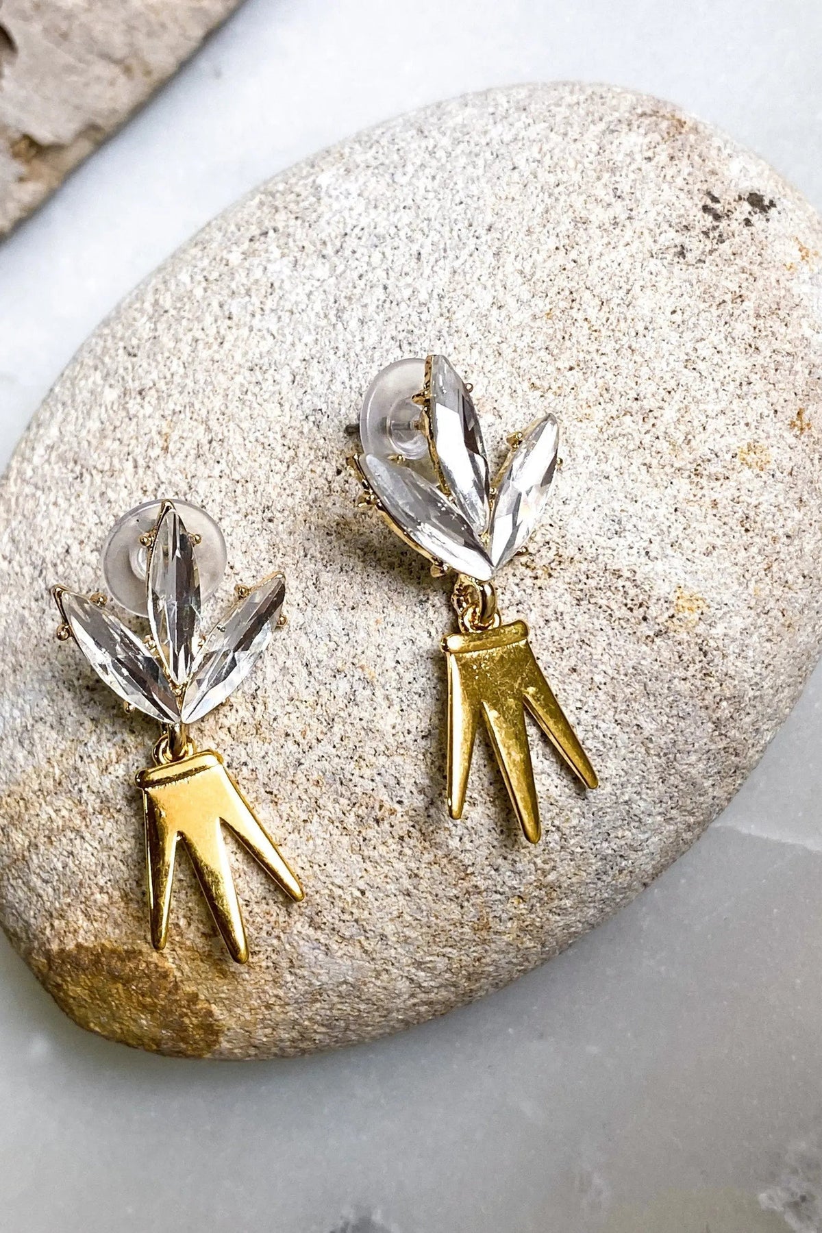 Gold Crown Earrings with gold-tone dangling crown shapes and clear faceted crystal leaf studs