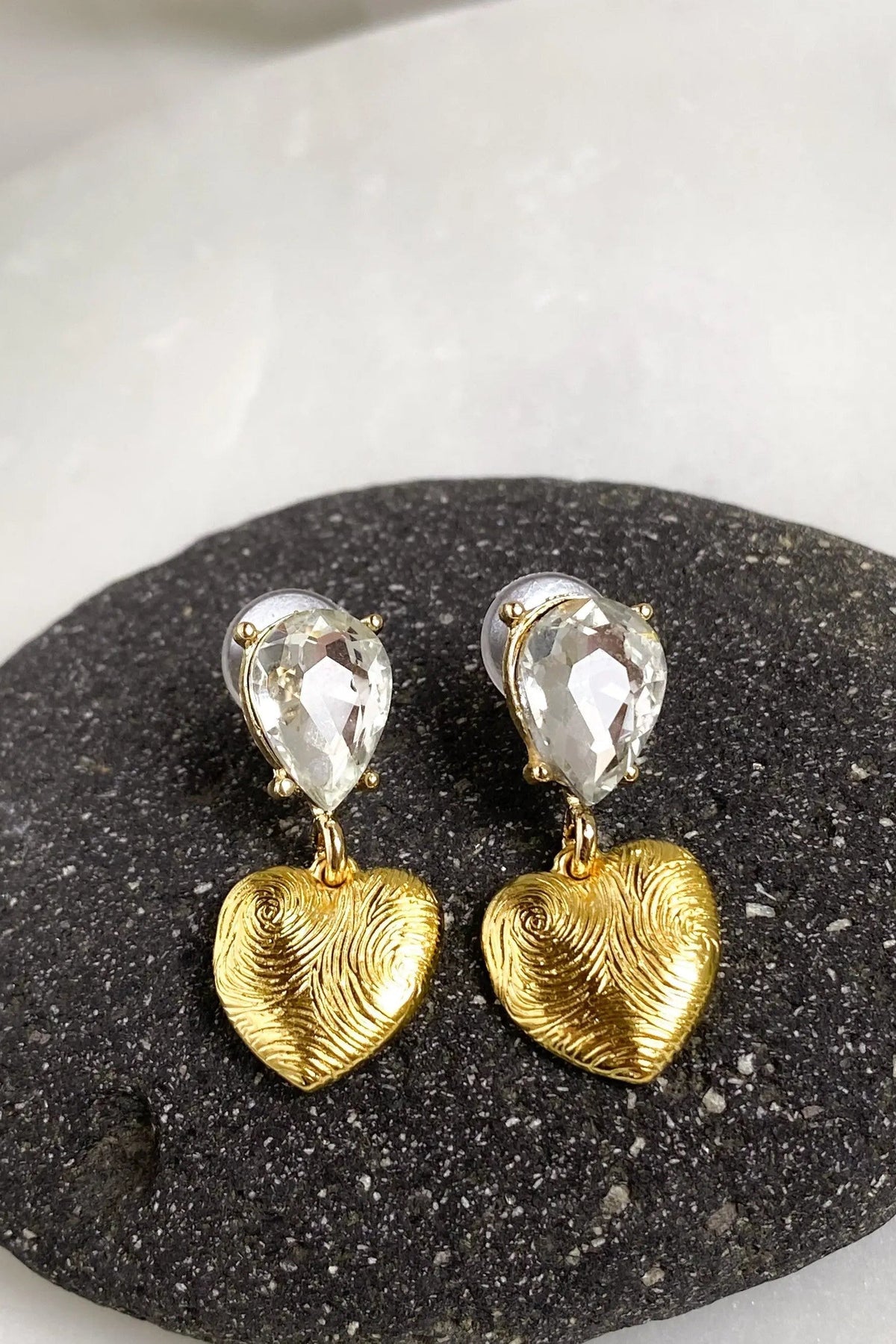 Gold Heart Earrings with textured gold-tone heart drops and clear faceted teardrop crystals above