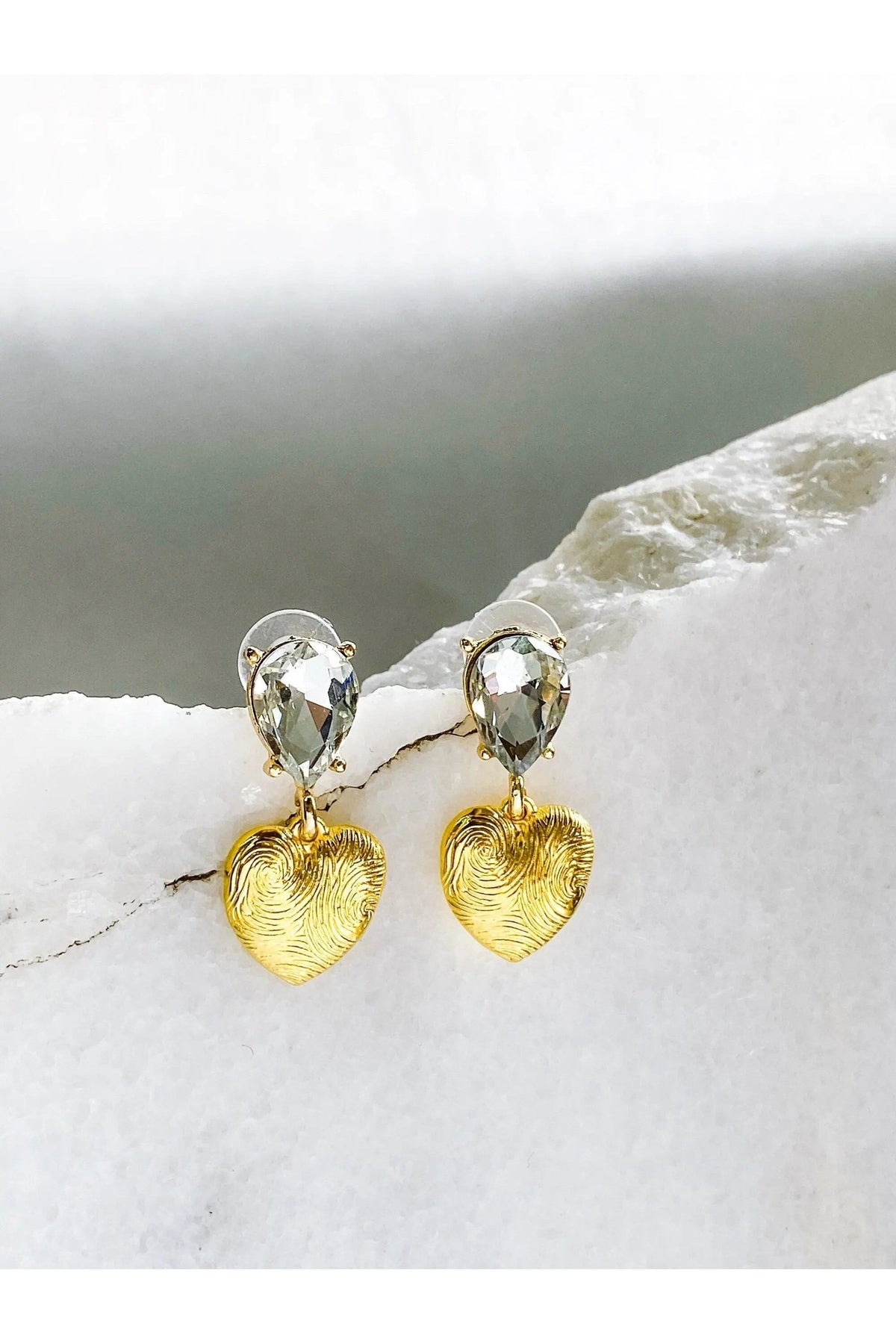 Gold Heart Earrings with textured gold-tone heart drops and clear teardrop crystals set above each heart