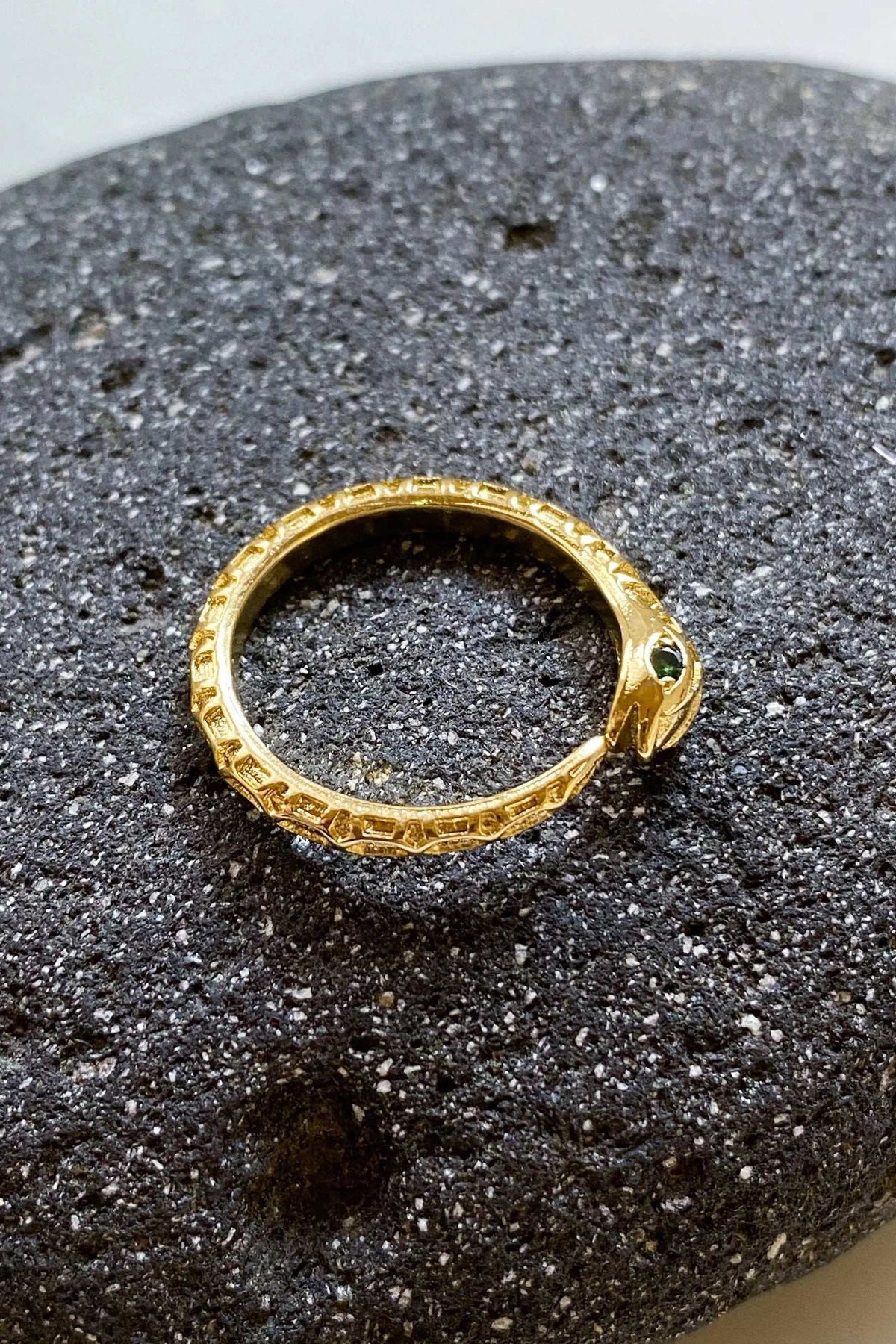 Gold Snake RING with a slender textured gold band and sculpted serpent head, shown without a visible stone
