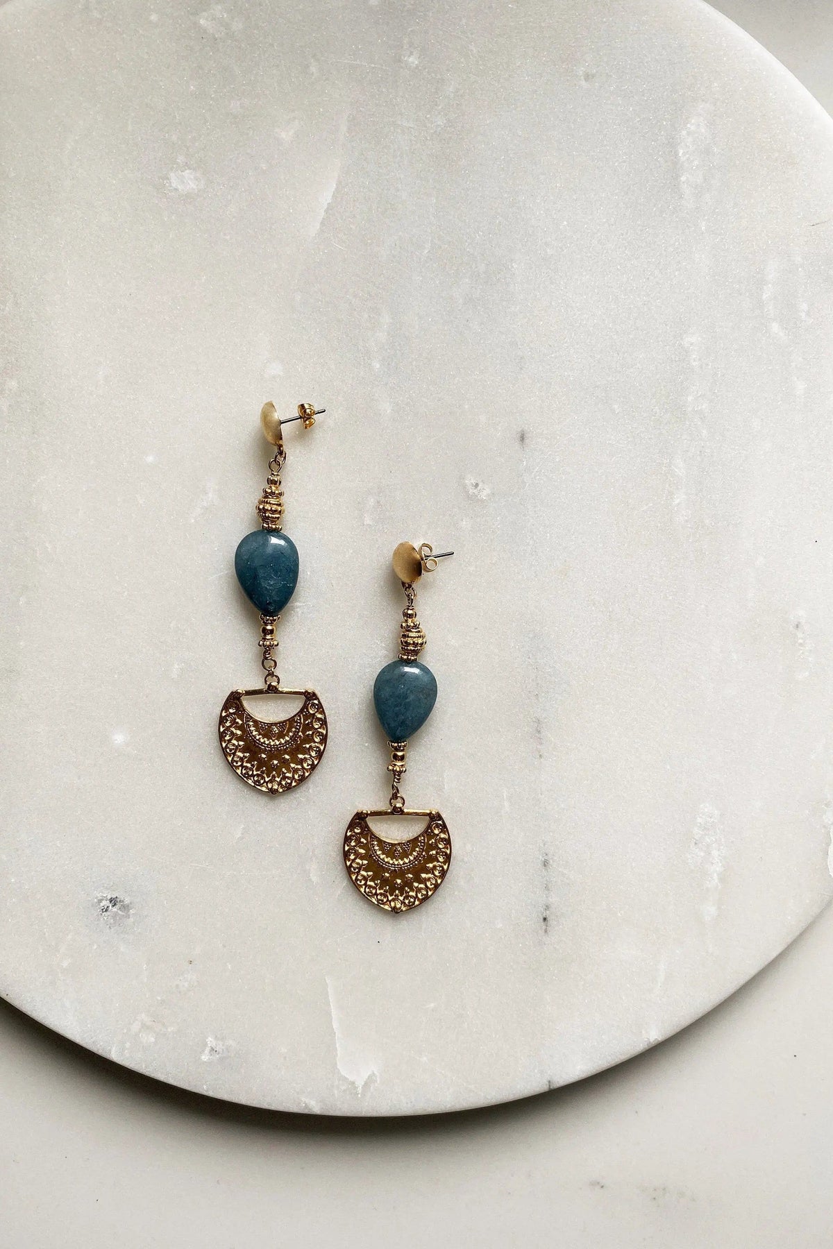 Gold Statement Dangle Earrings with blue oval stones and ornate gold-tone crescent charms in a dangling design