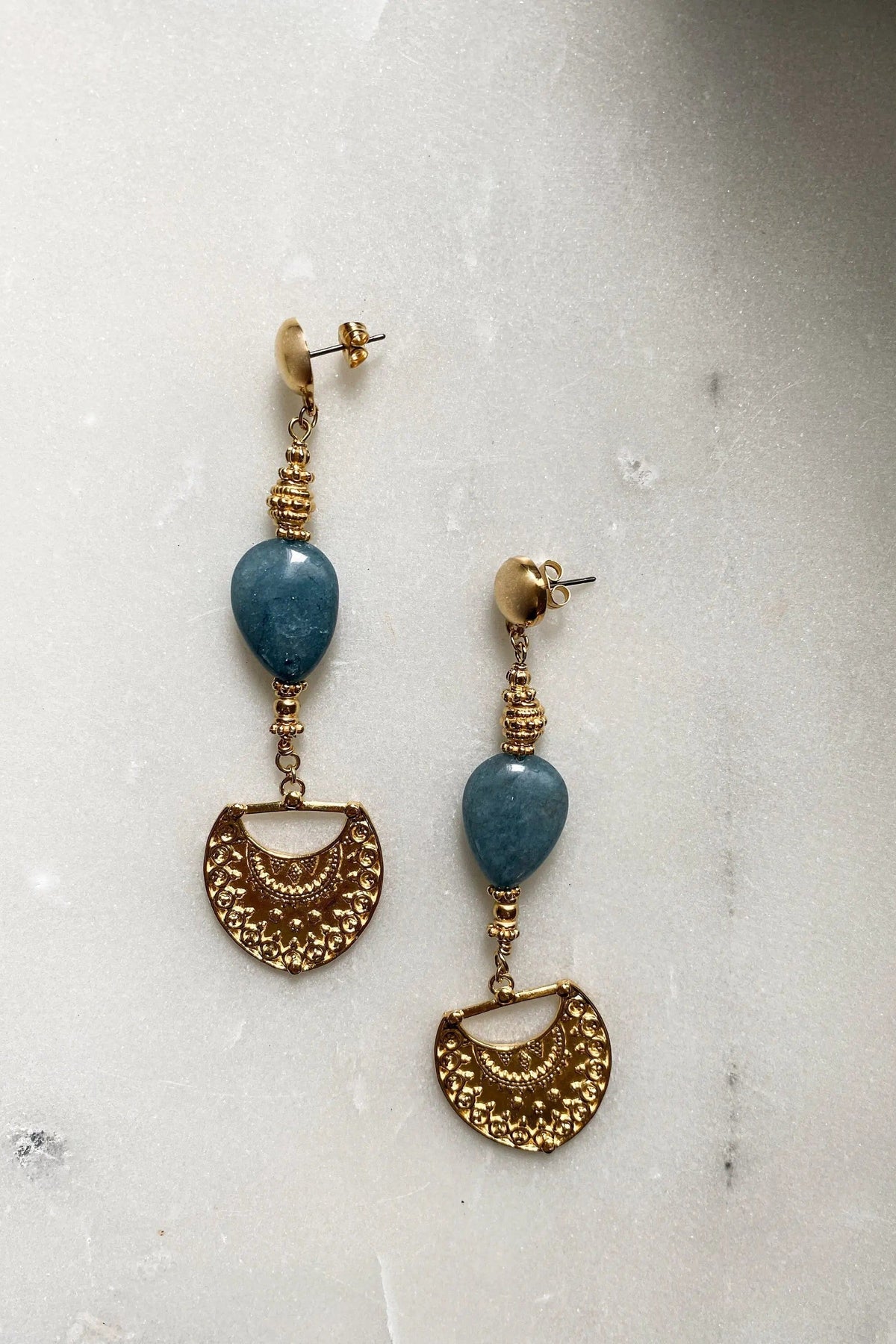 Gold Statement Dangle Earrings with blue oval stones and ornate textured gold-tone shield-shaped drops