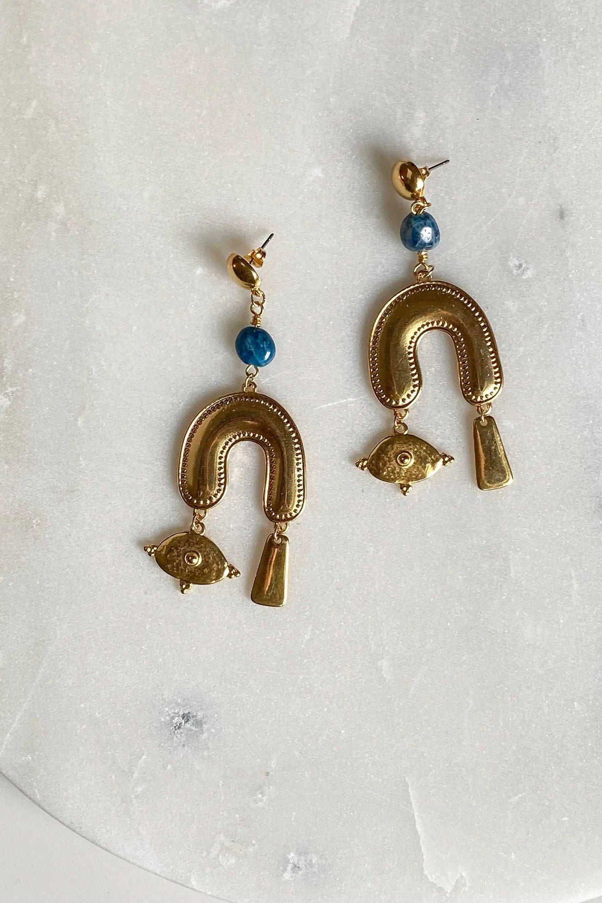 Gold Statement Earrings with blue agate beads and textured gold-tone U-shaped drops, finished with eye charms