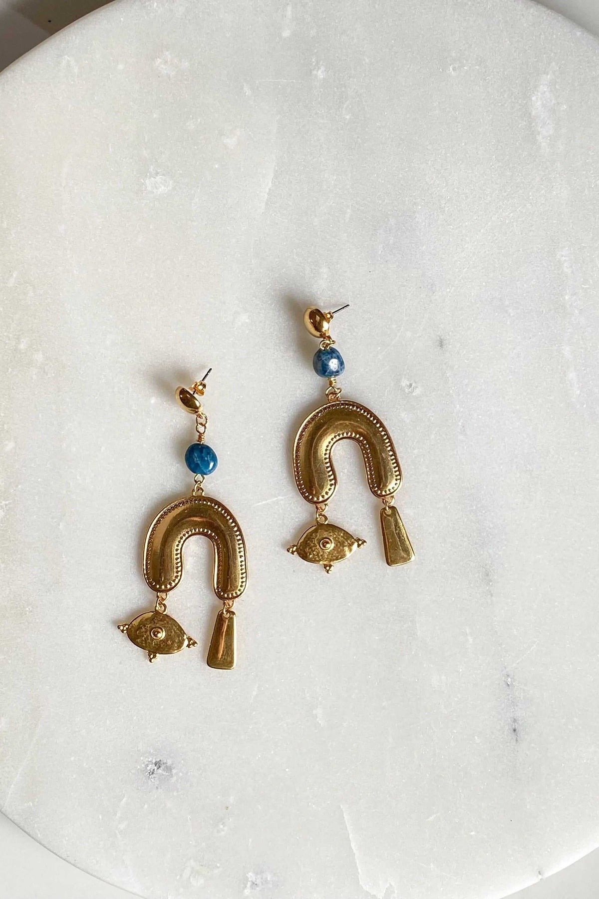 Gold Statement Earrings with blue beads, ornate gold-toned brass arches, eye charms, and dangling bar details