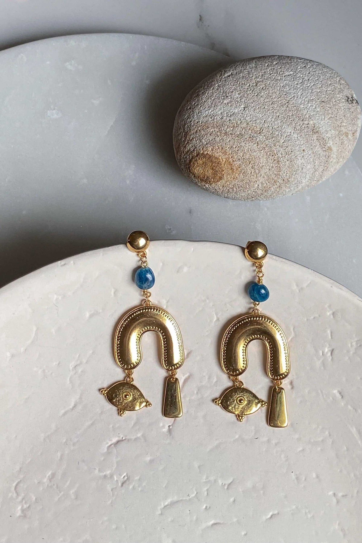 Gold Statement Earrings with blue beads, textured horseshoe arches, fish charms and dangling geometric accents