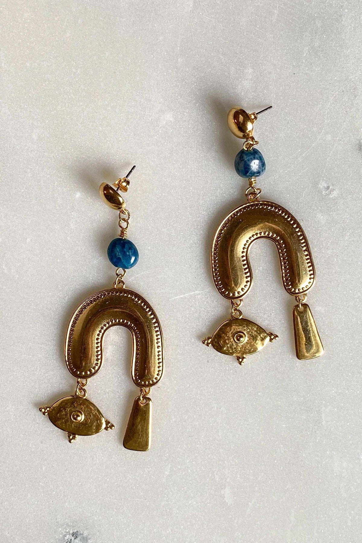 Gold Statement Earrings with blue round beads, textured U-shaped gold-tone drops, and dangling eye charms