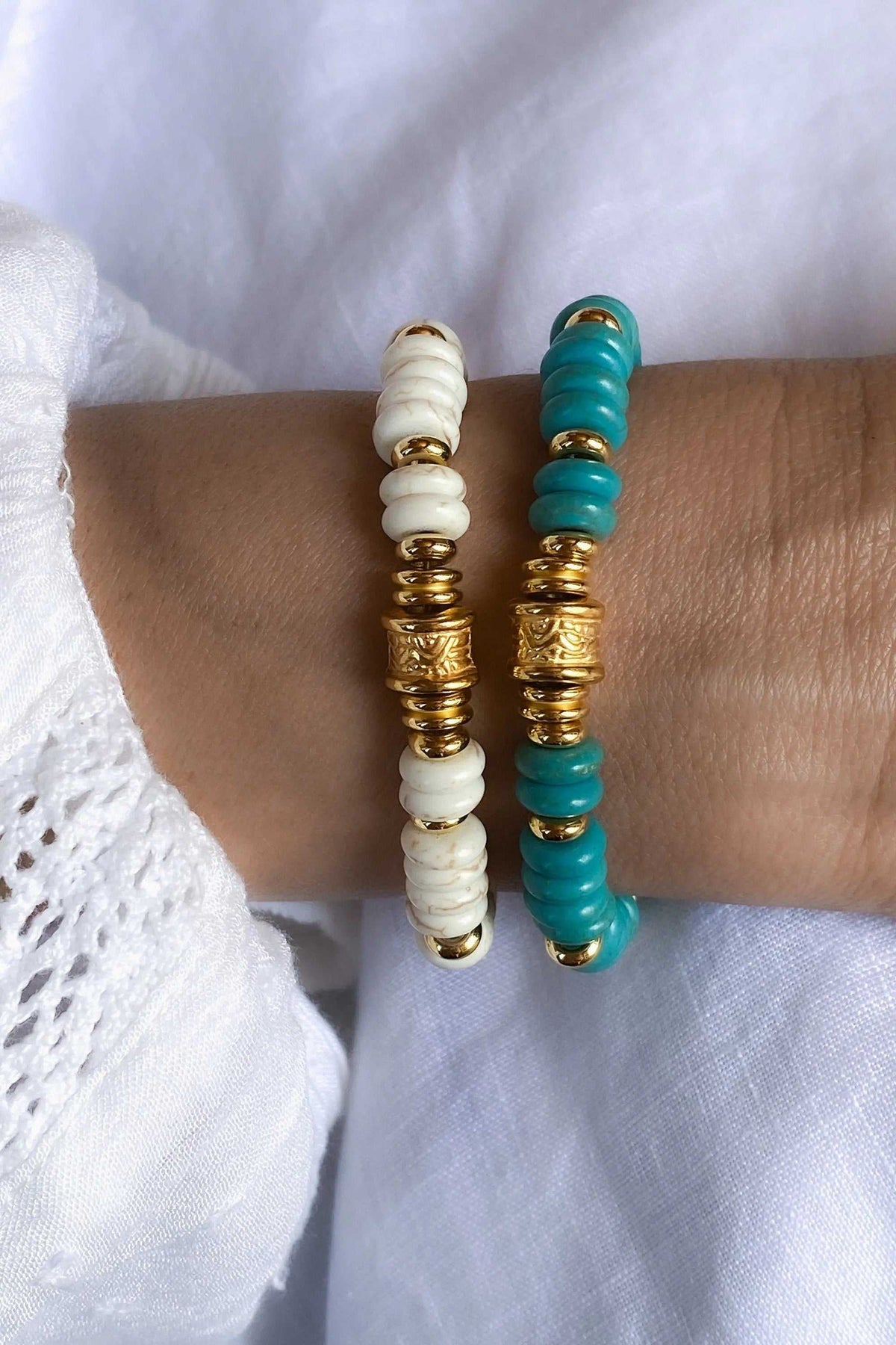 Heishi howlite beads bracelet with white and turquoise disc beads, ornate gold-tone spacers and barrel details
