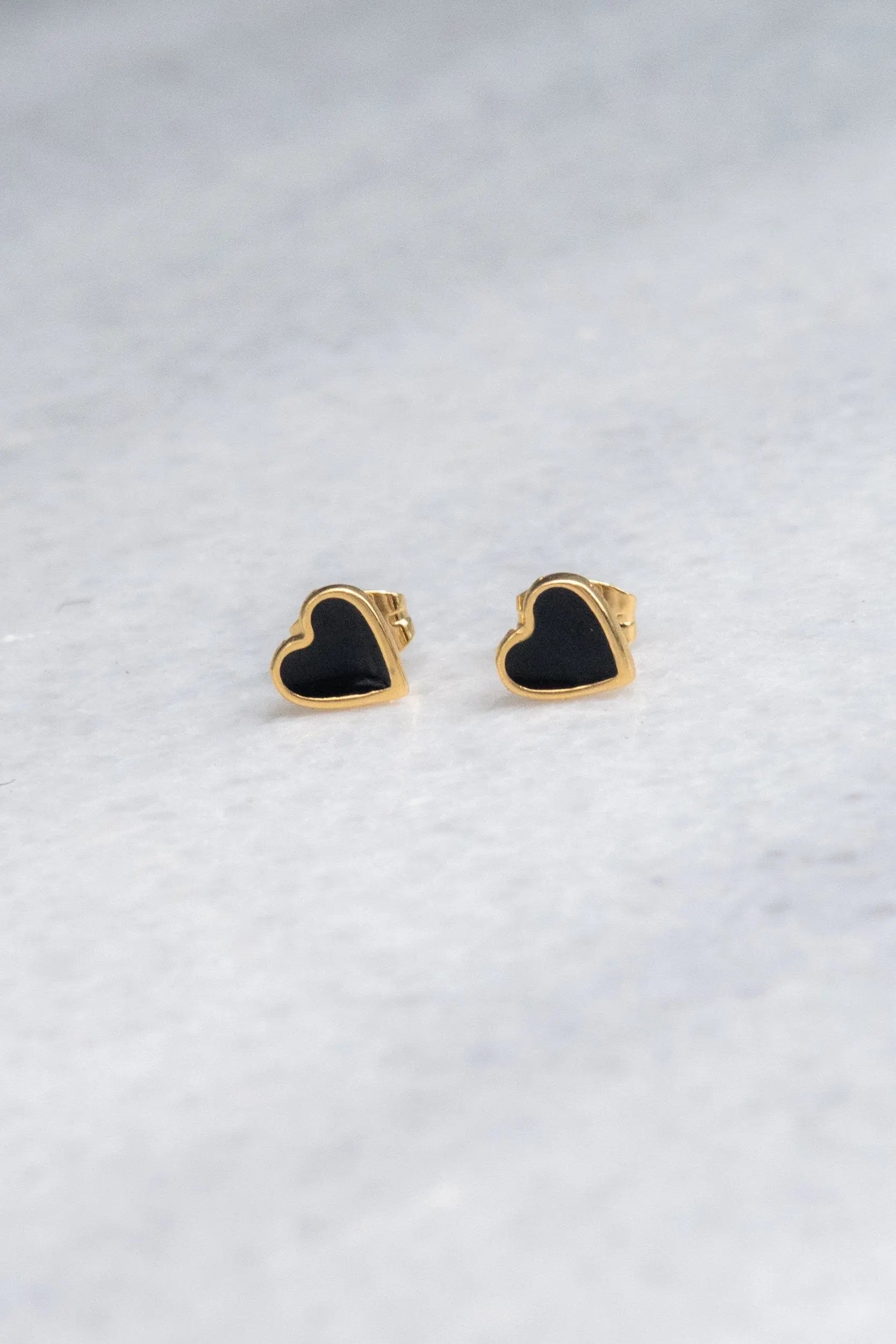 Tiny black heart earrings