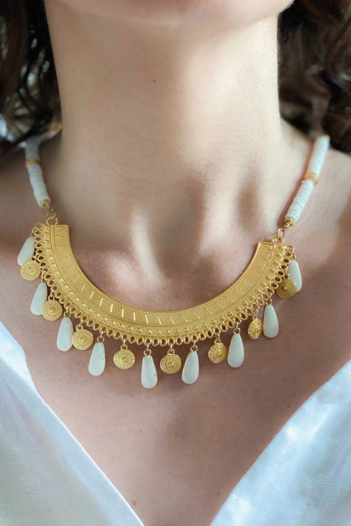 ILIADA NECKLACE shell and gold-tone statement necklace with engraved crescent pendant and enamel charms