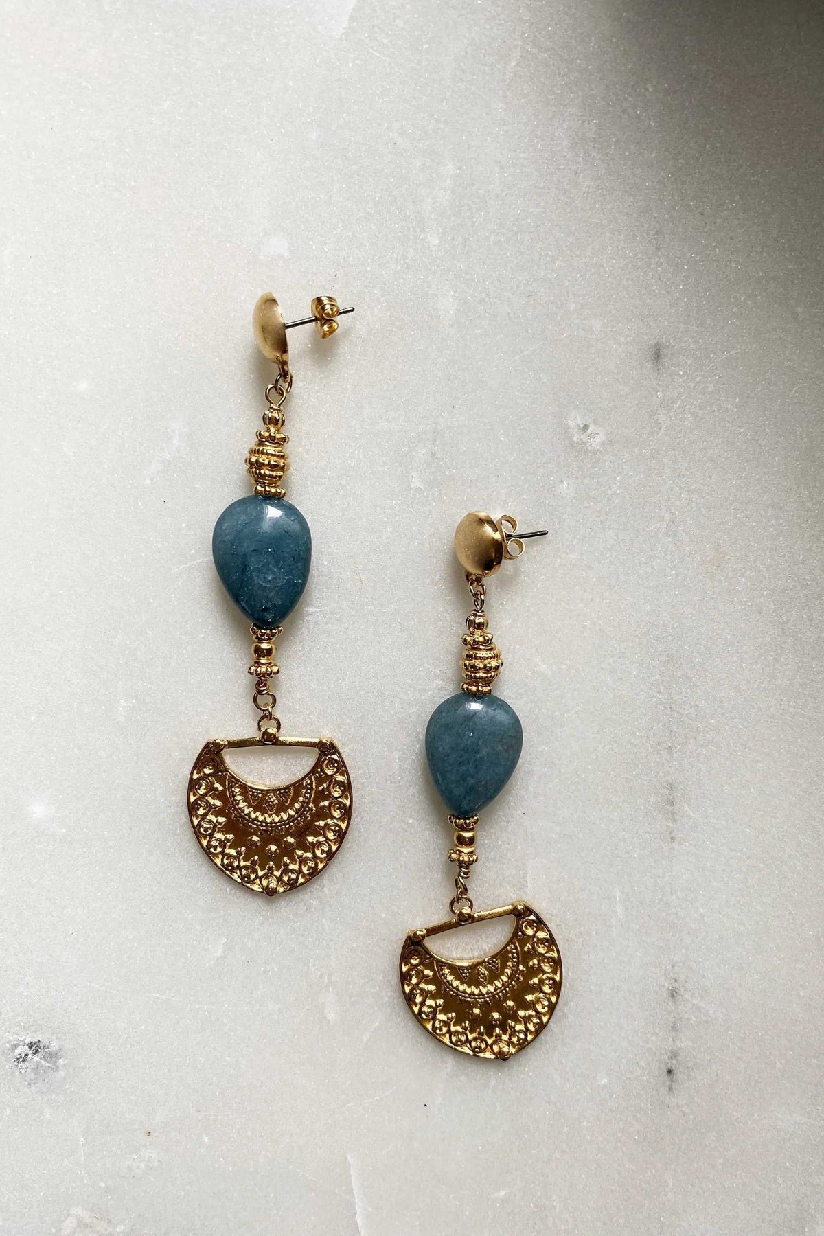 INÓ EARRINGS featuring blue jade teardrop stones, gold-toned brass details and ornate fan-shaped drops