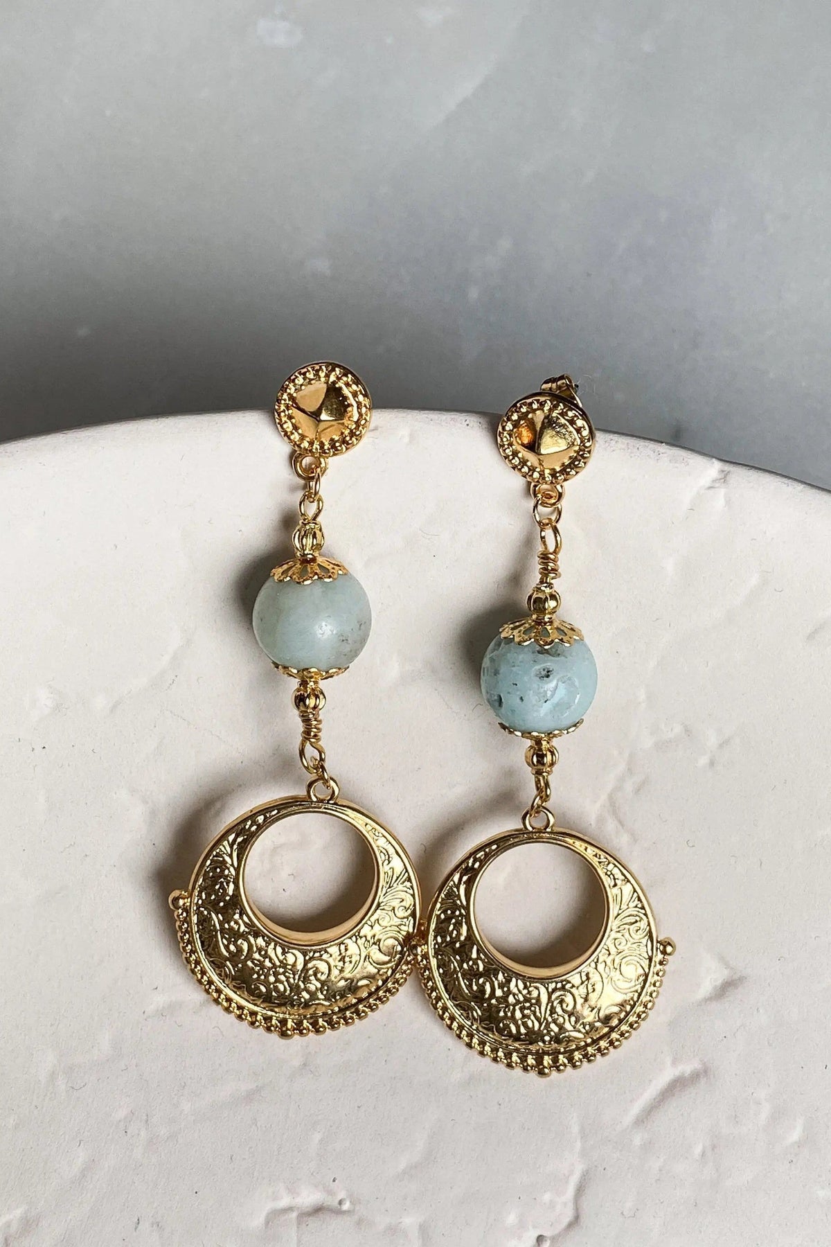 IRIS Amazonite Earrings with pale blue round stones, ornate gold-tone filigree drops and circular sunburst studs