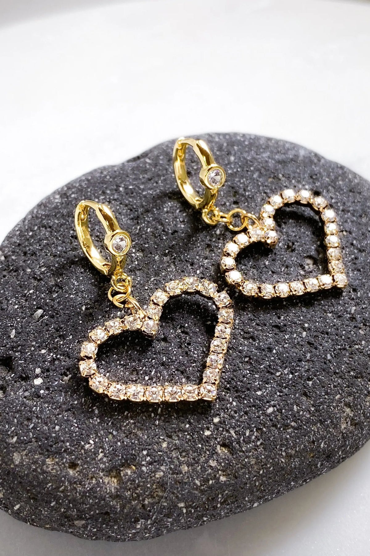 Large Heart Earrings in gold-tone metal with sparkling clear crystal heart outlines and small crystal huggie hoops