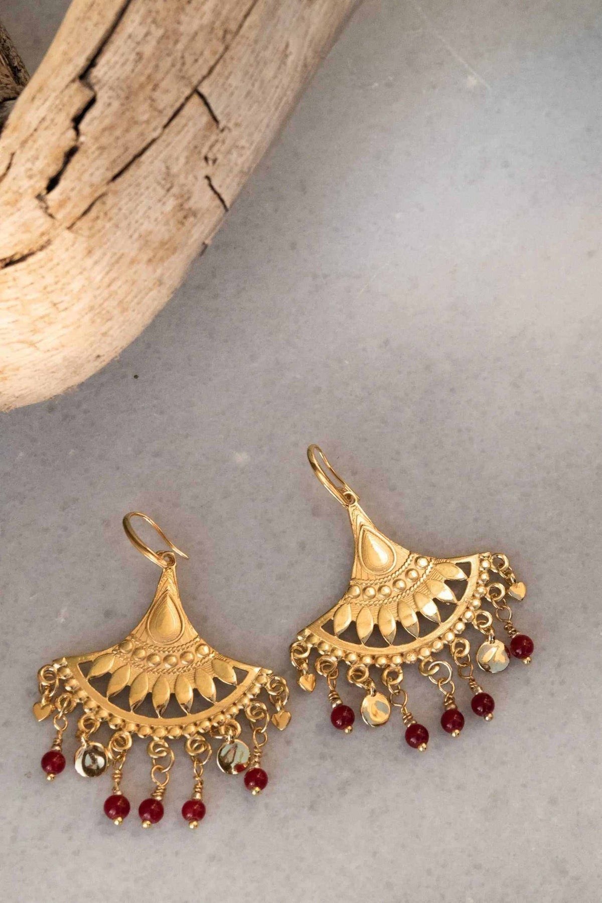 LITÓ EARRINGS, ornate gold-tone fan-shaped drops with cutout details, clear accents and dangling red beads