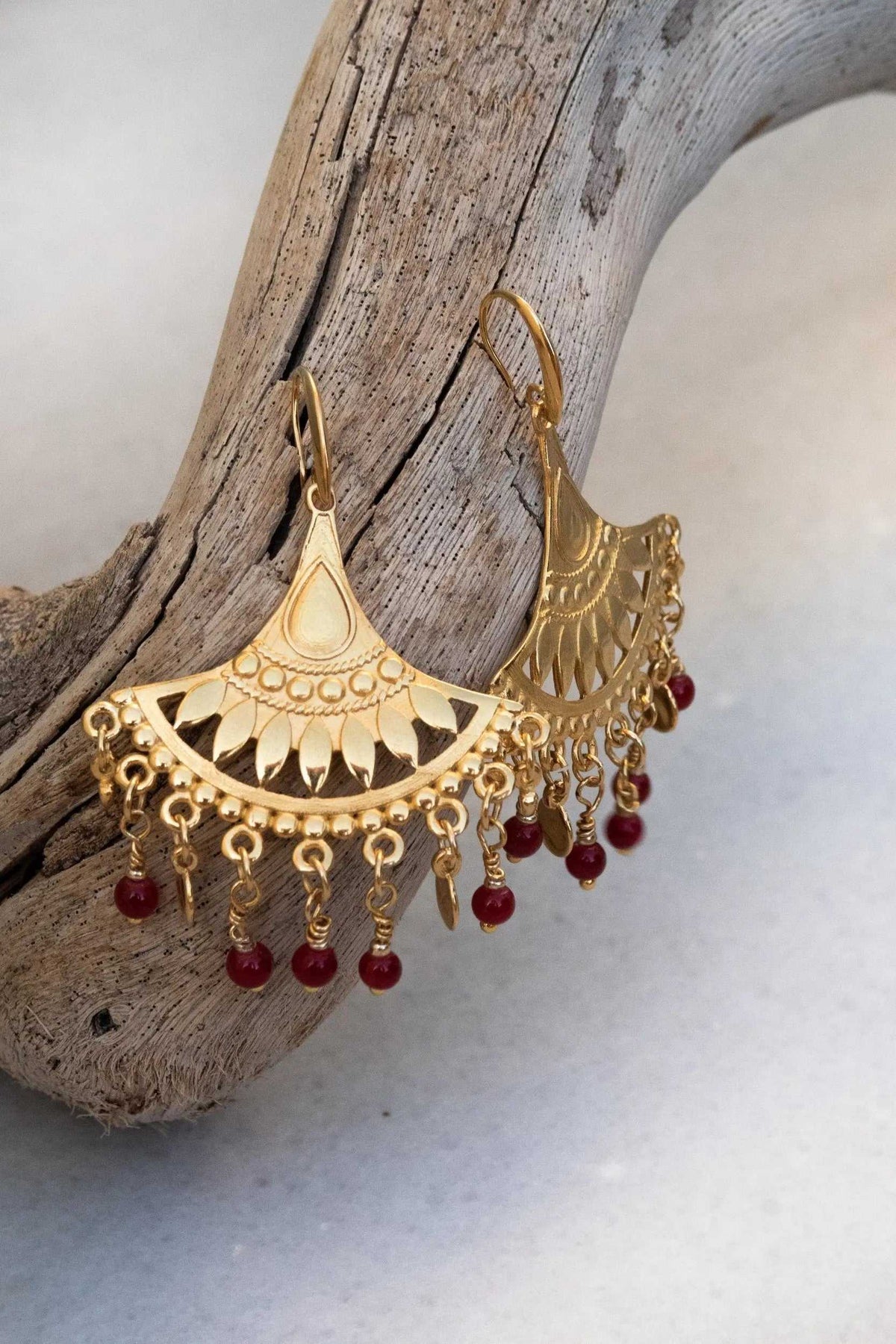 LITÓ EARRINGS gold-toned statement earrings with fan-shaped filigree and dangling red glass beads