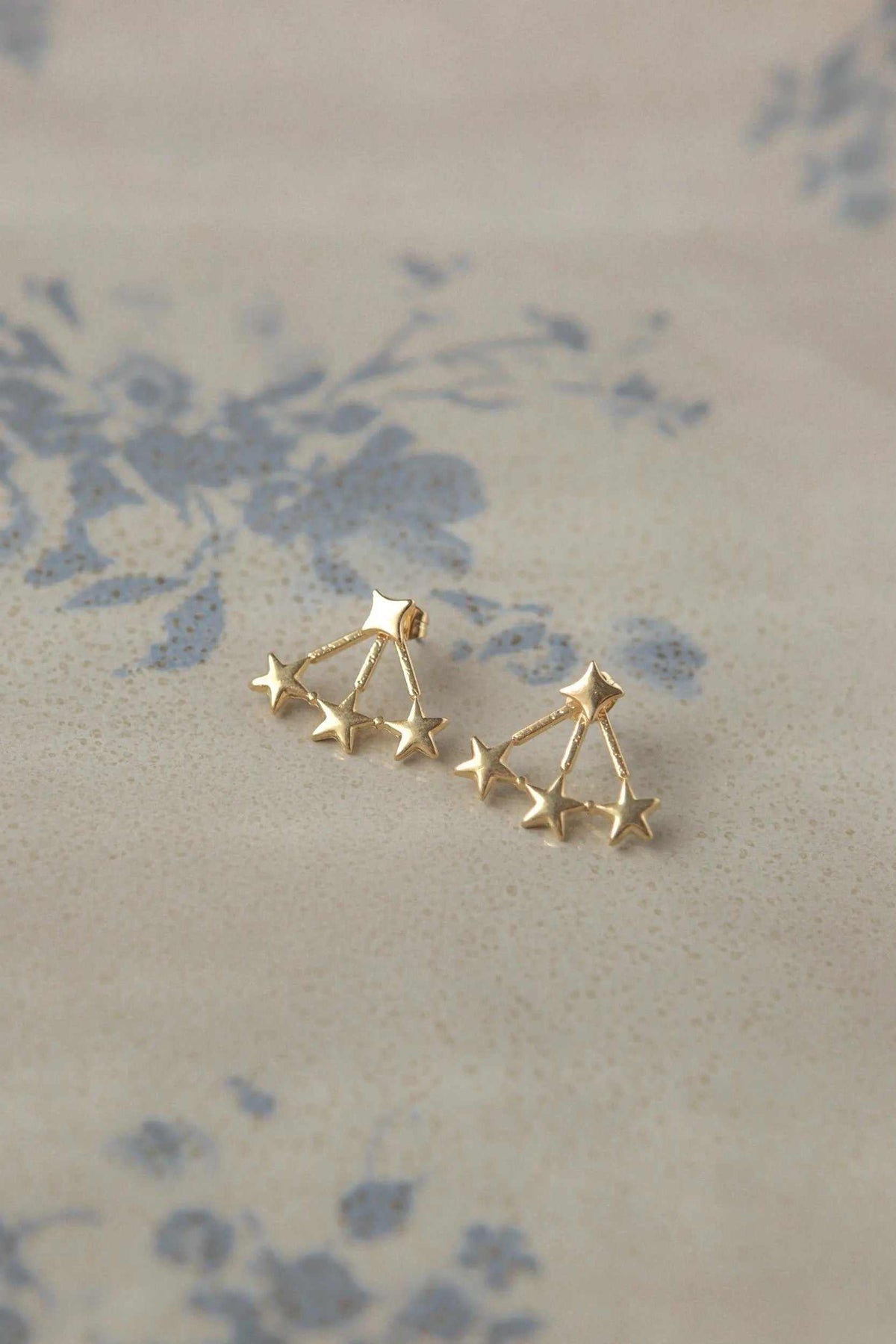 Little stars Earrings in gold-tone metal, featuring delicate linked star shapes with pointed details