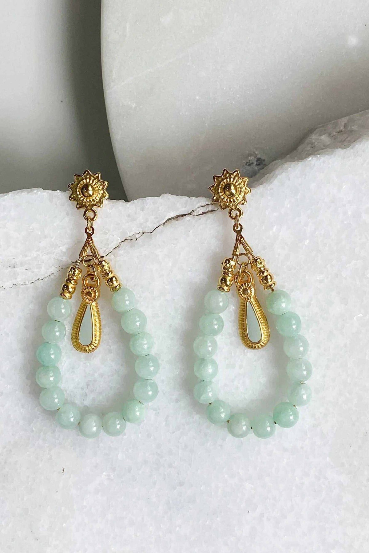 LUNO Oversize hoops earrings with pale green jade-like beads, gold-tone ornamental studs and teardrop charms