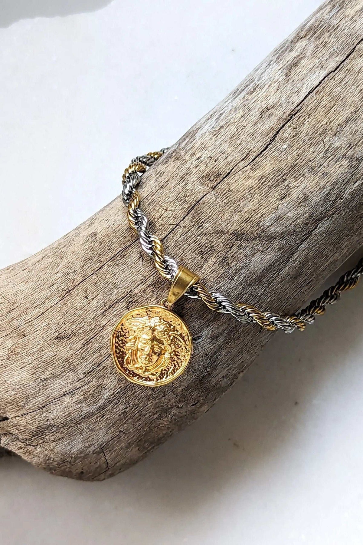 Medusa Chain Necklace with a gold Medusa coin pendant and twisted two-tone silver and gold rope chain