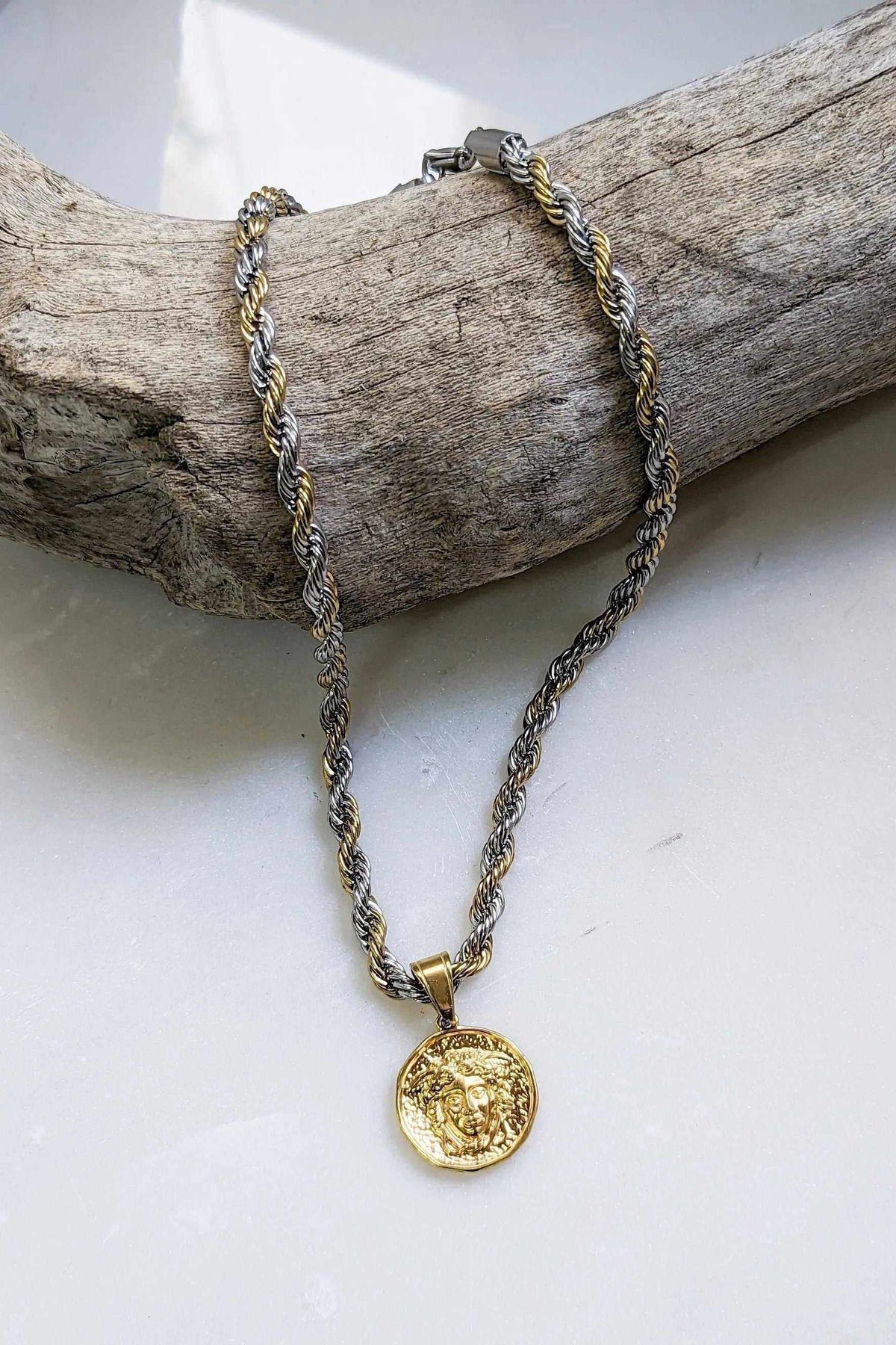Medusa Chain Necklace in gold and silver steel rope chain with a round gold Medusa coin pendant
