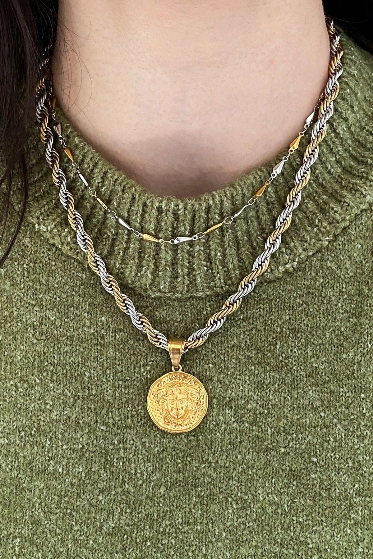 Medusa Chain Necklace with a mixed gold and silver twisted rope chain and round gold Medusa coin pendant