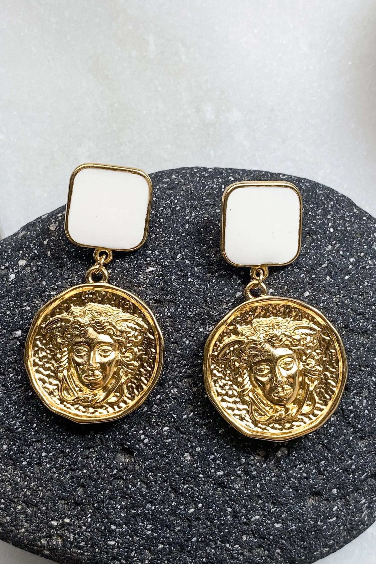 MEDUSA Gold Coin Earrings with gold-tone square tops and round embossed Medusa coin pendants in a polished finish
