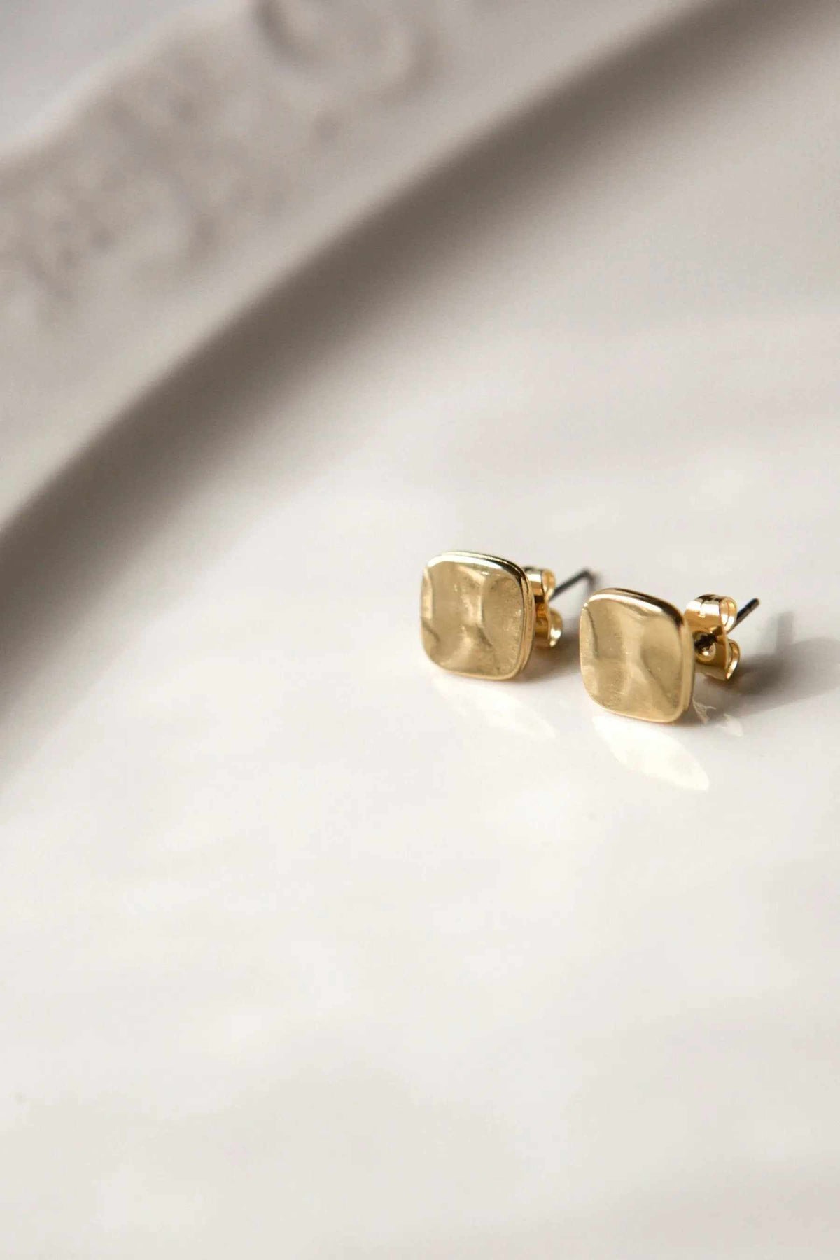 Mini Antique Square earrings in gold-tone metal with softly rounded square fronts and titanium post backs