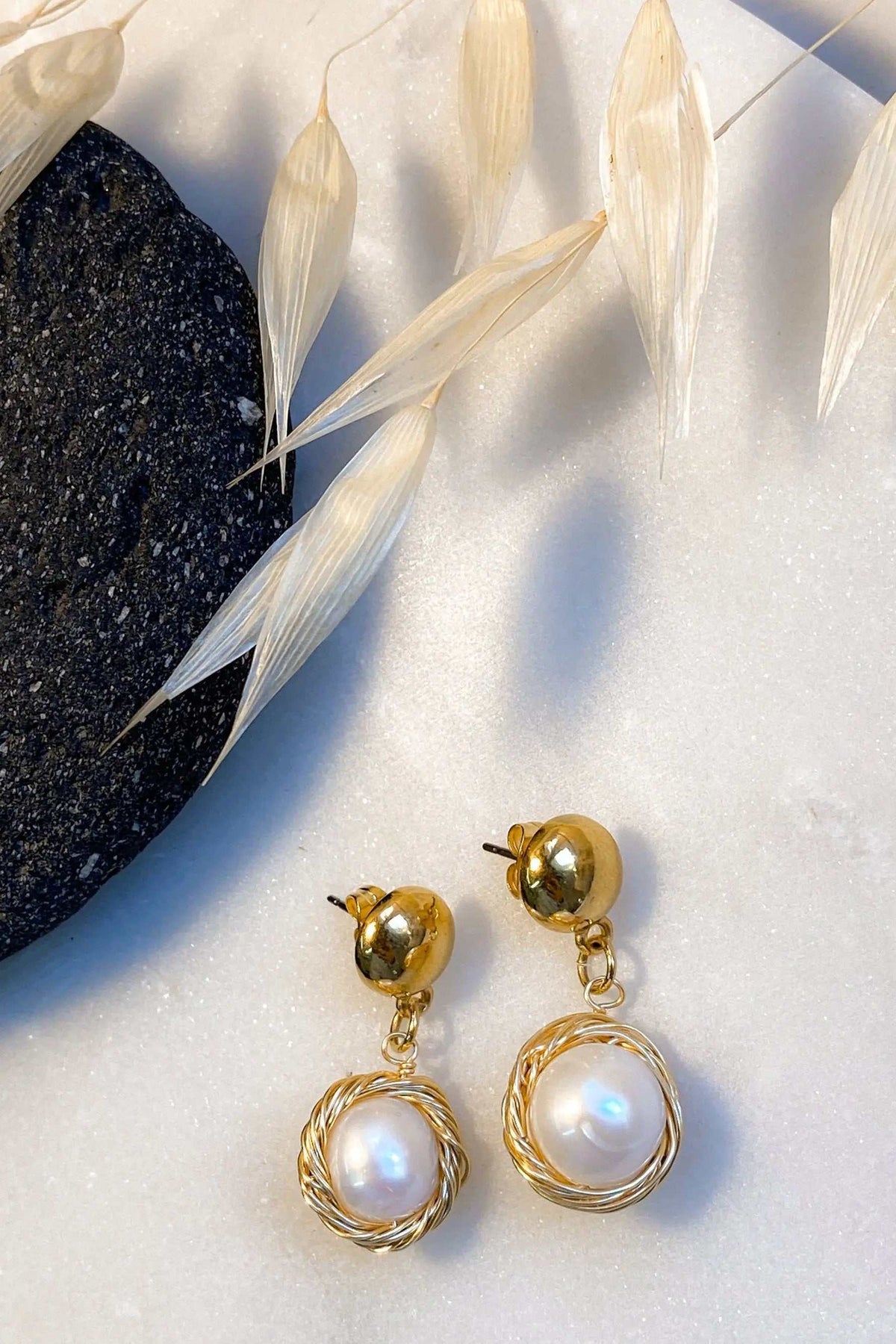 Mother of pearl Earrings with luminous white pearl drops in gold-toned wire-wrapped circular settings