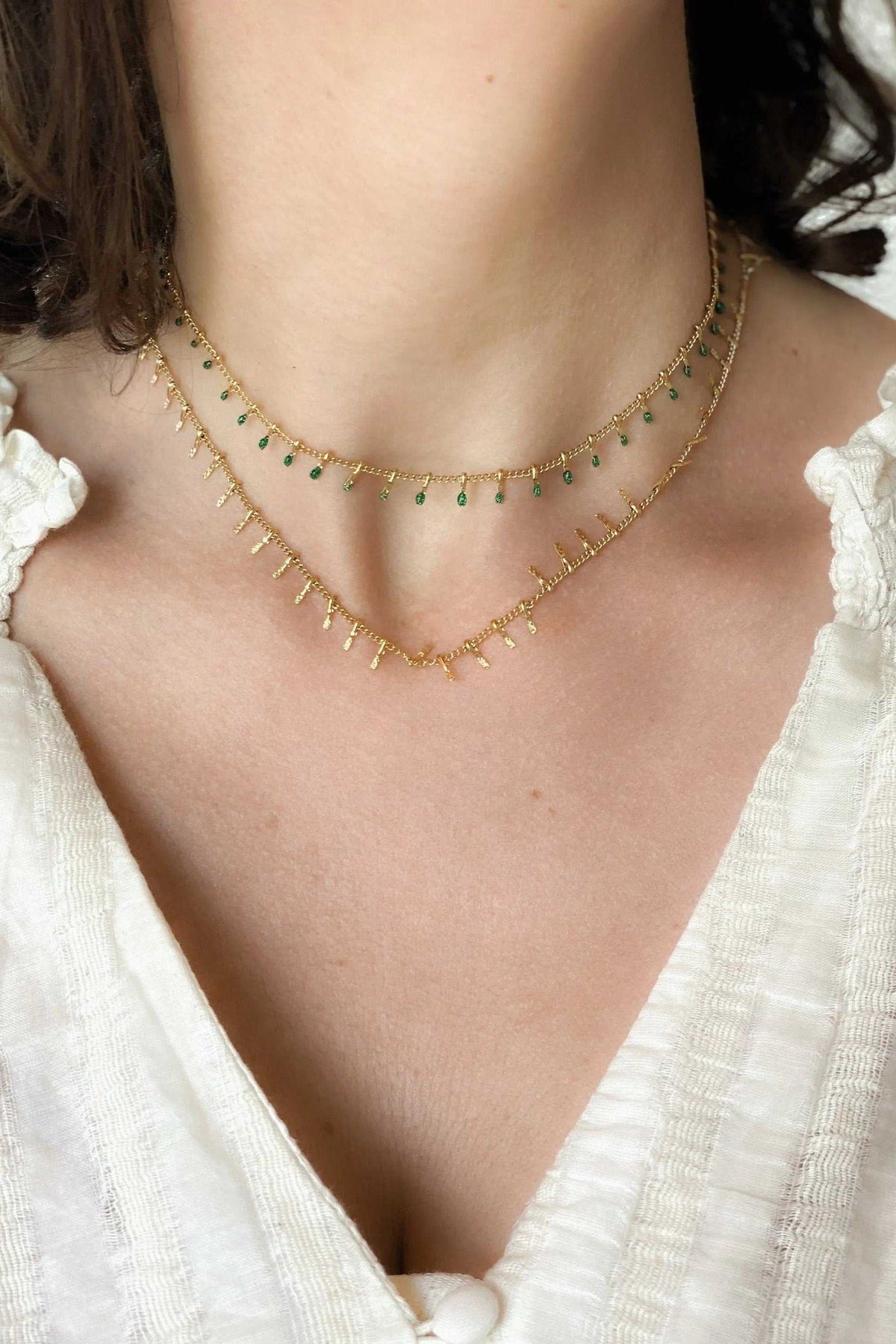 Mum Gift Dainty Necklace in gold-tone metal with delicate chains and small green drops, layered design