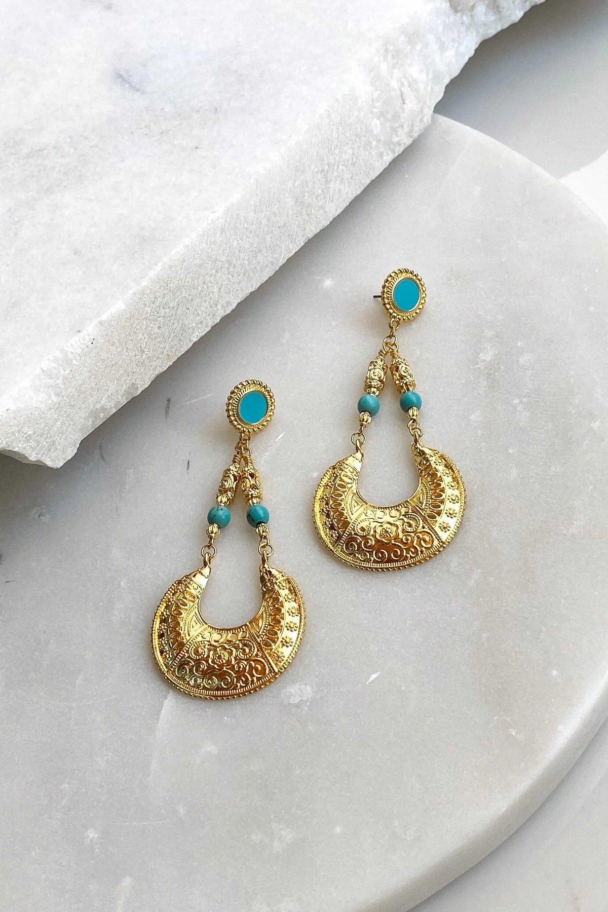 MYRTÓ EARRINGS in gold-plated brass with turquoise beads, featuring oversized ornate teardrop designs