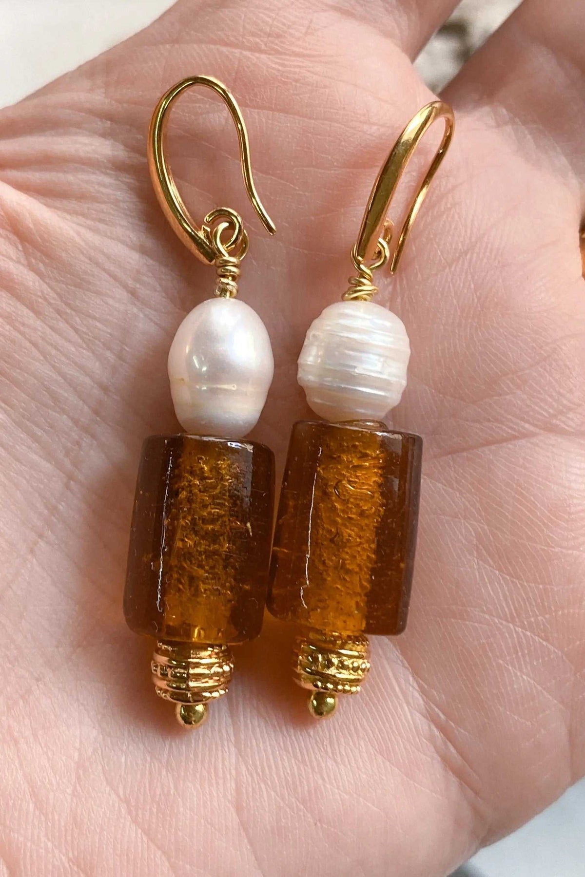 NATASSA Brown crystal earrings with amber-brown rectangular beads, white freshwater pearls and gold-tone hooks