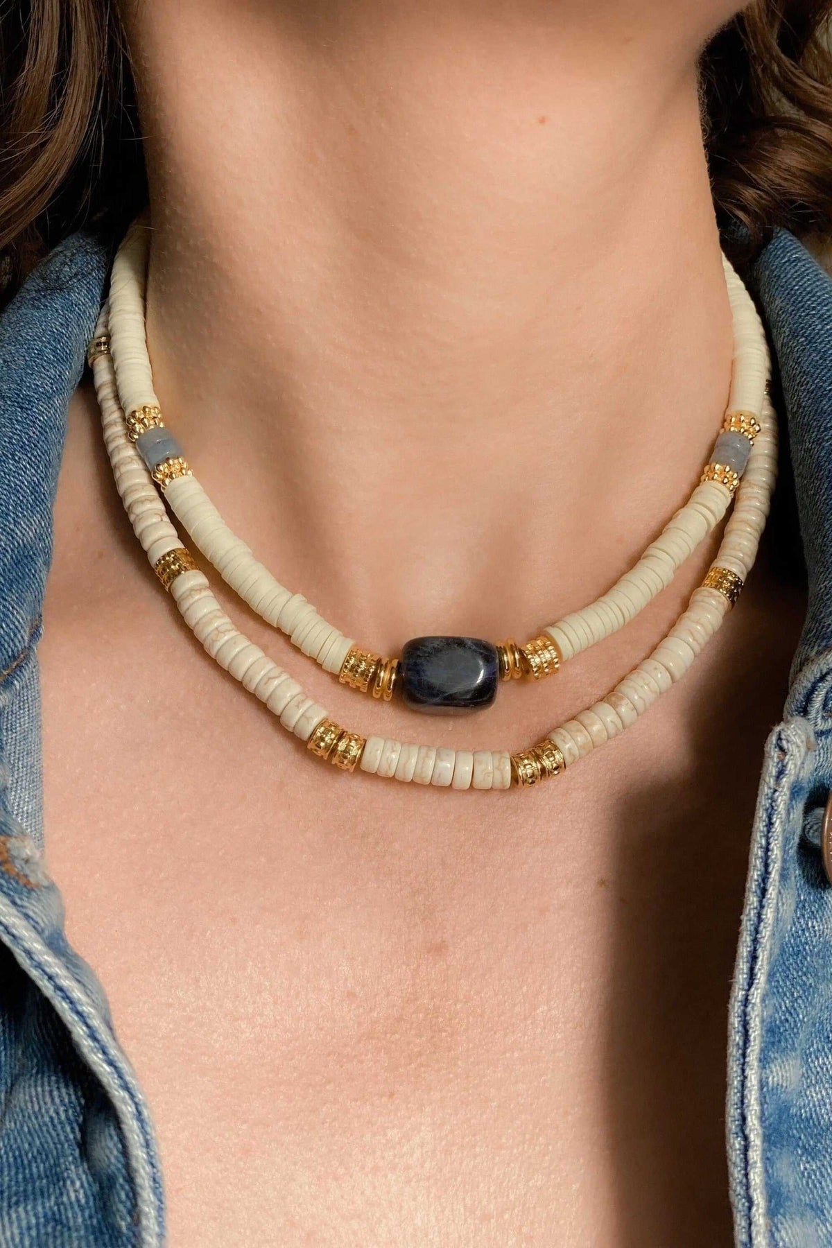 Necklace Heishi Boho Sodalite with white heishi beads, dark blue stone, and gold-plated details