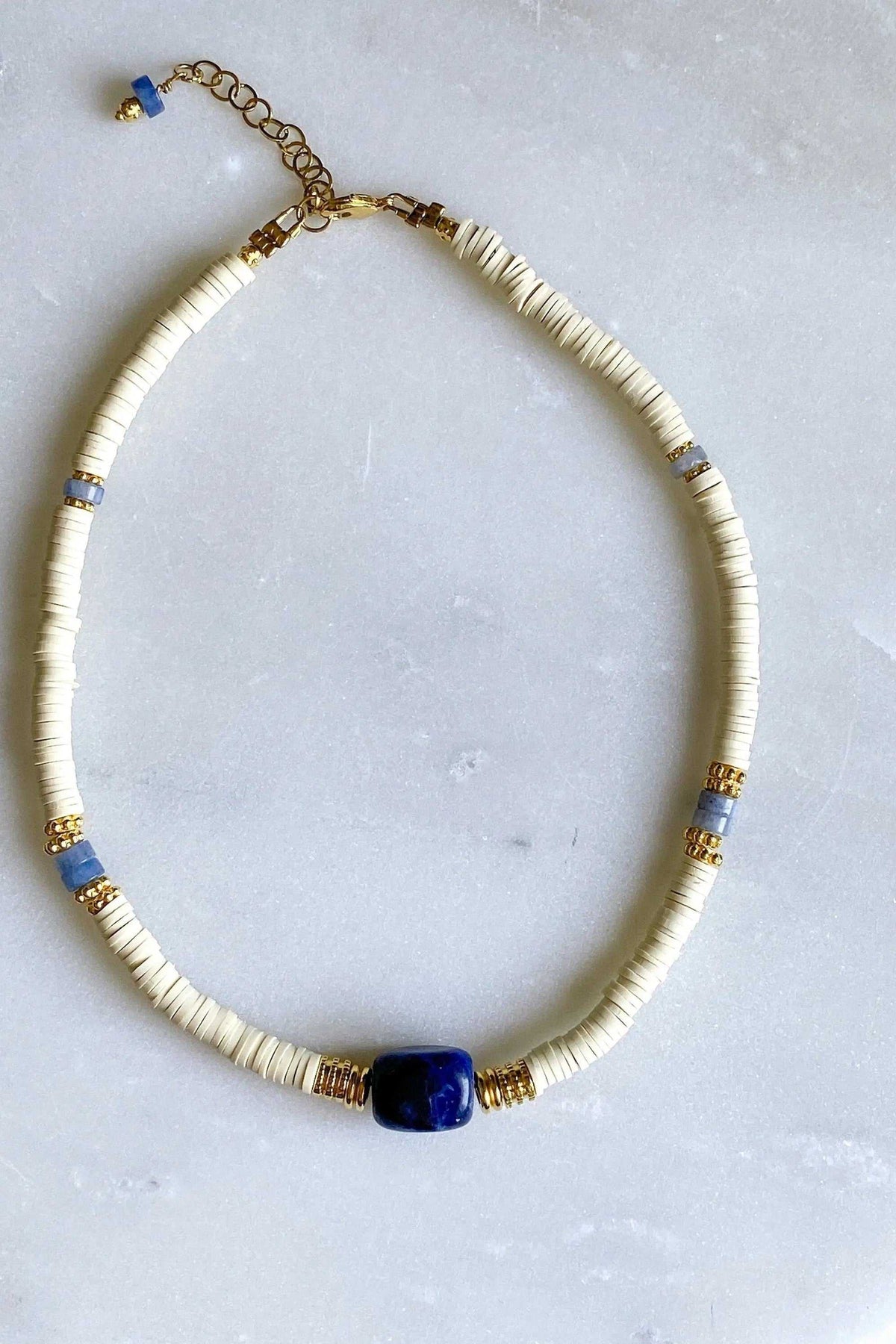 Necklace Heishi Boho Sodalite with white heishi beads, blue sodalite centre stone, gold accents and extender chain