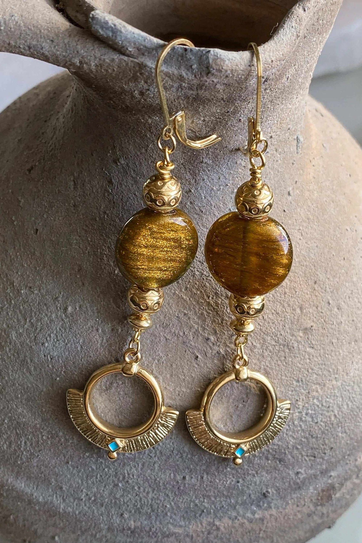 ODYSSOS EARRINGS with amber-brown textured round beads, ornate gold-tone metal details and small turquoise accents