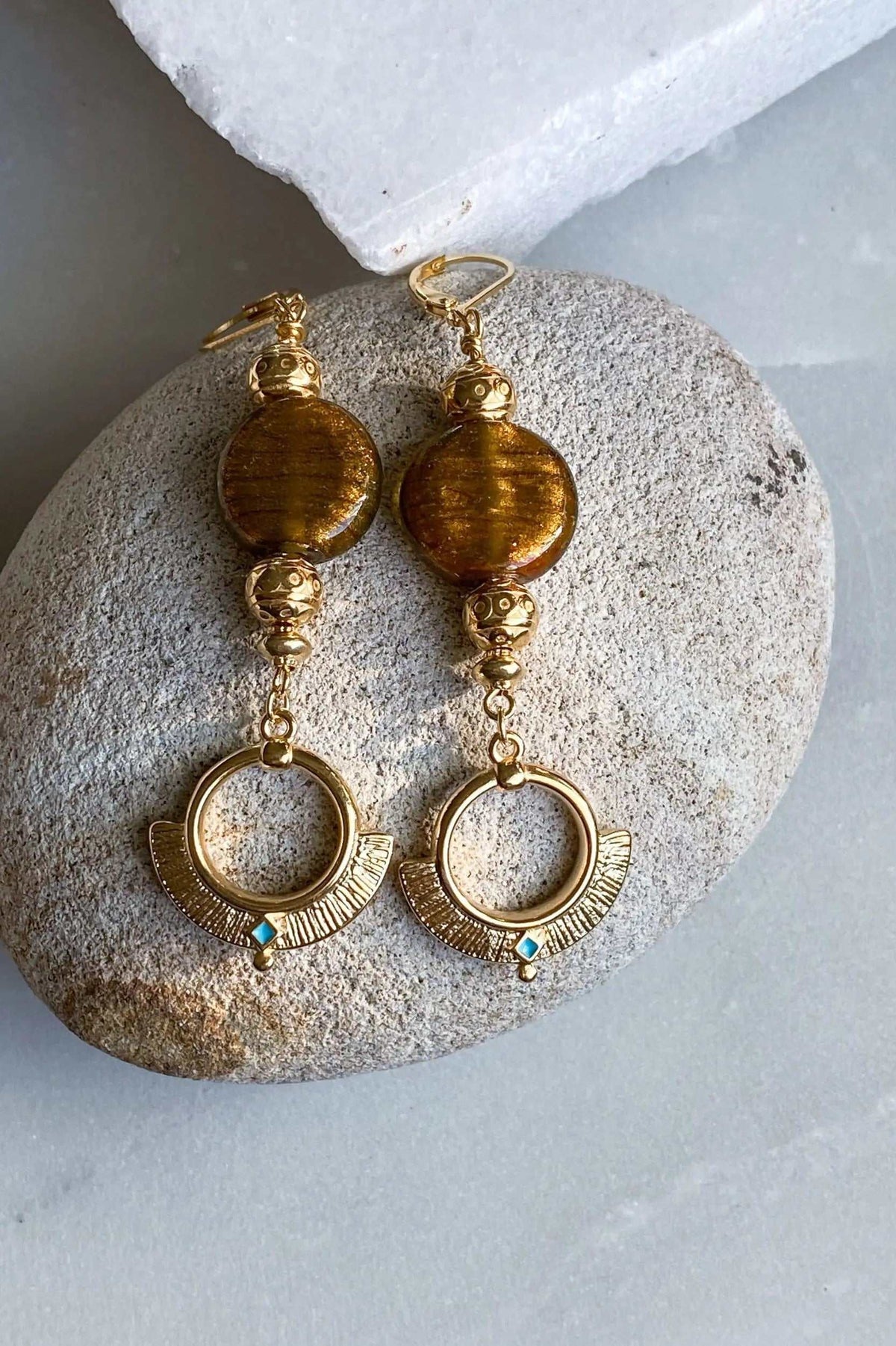 ODYSSOS EARRINGS in gold-tone brass with amber-brown round stones, ornate detailing and turquoise accents