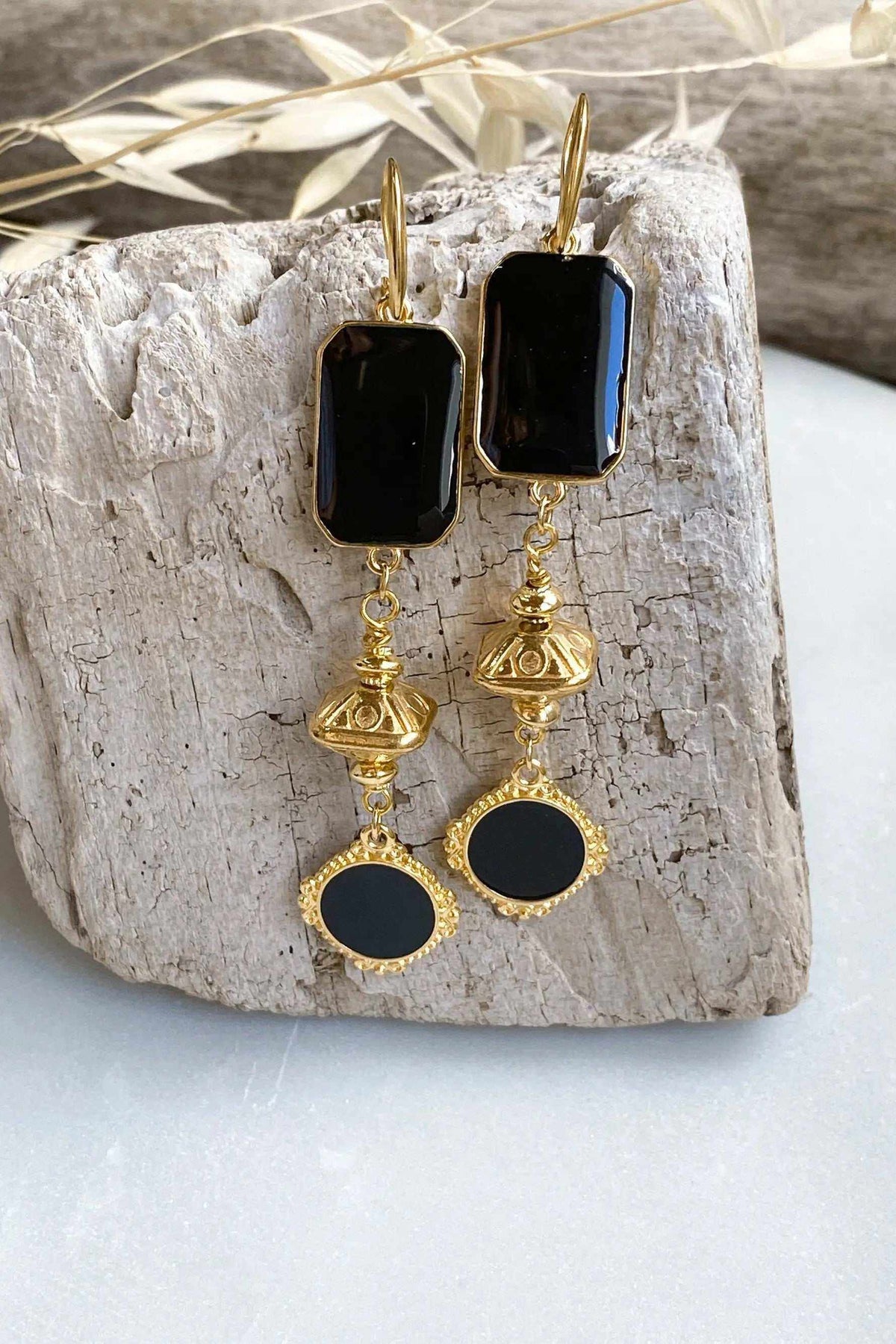 ONIRO Black and gold Boho earrings with glossy black rectangular and oval resin stones, ornate gold-tone dangling details
