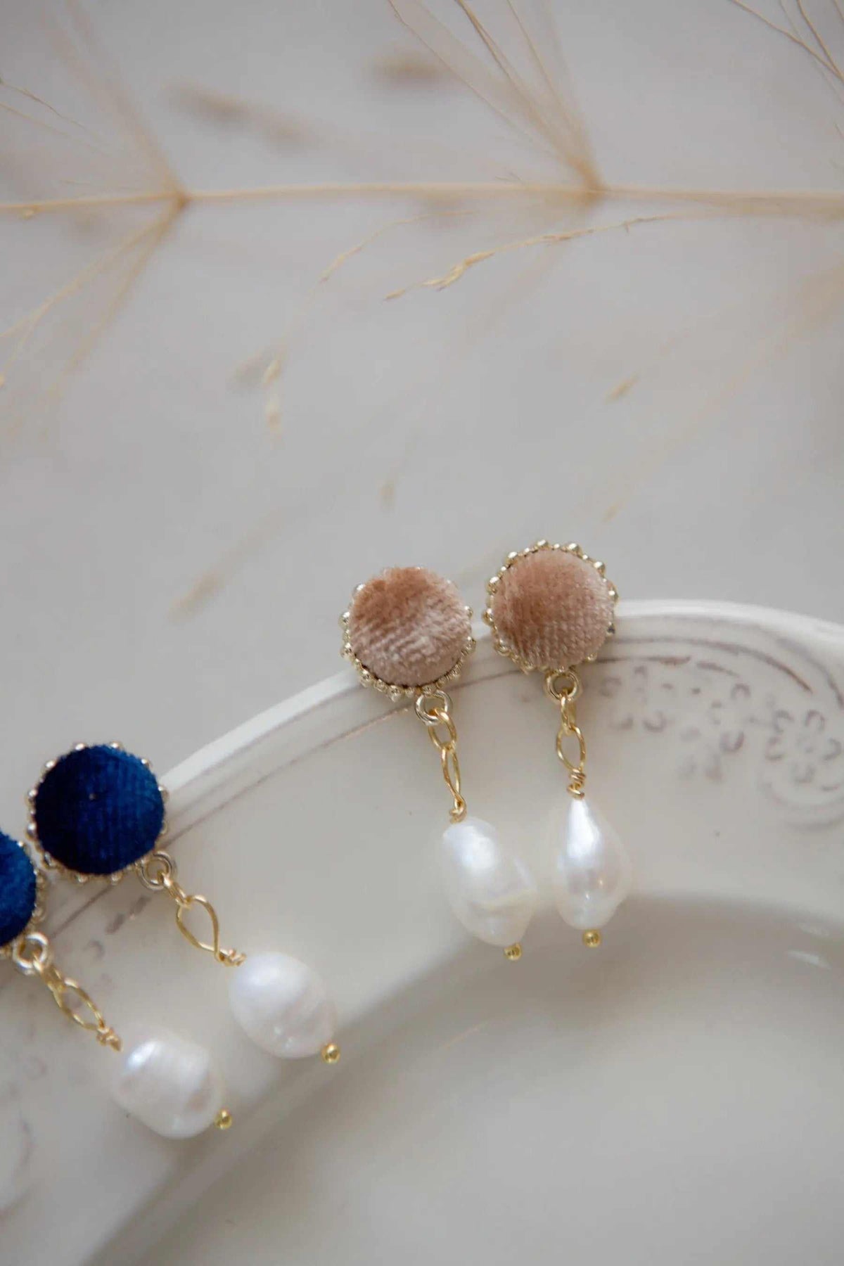Pearl & velvet Earrings with beige velvet studs, gold-tone chains, and hanging freshwater pearls