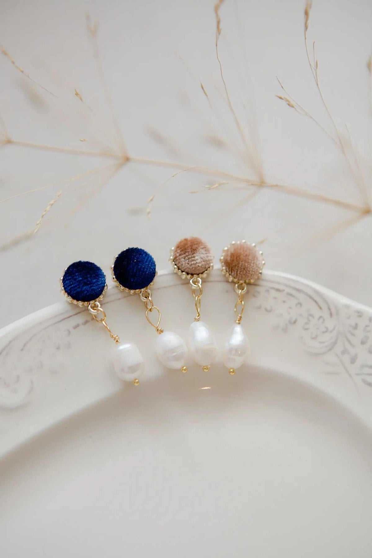 Pearl & velvet Earrings with blue and beige velvet tops, freshwater pearl drops, and gold-tone metal details