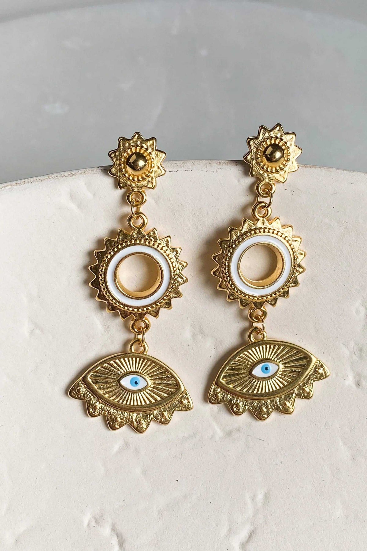 PYTHIA Statement Evil eye earrings in ornate gold-tone metal with blue-and-white enamel eye motifs and dangling charms