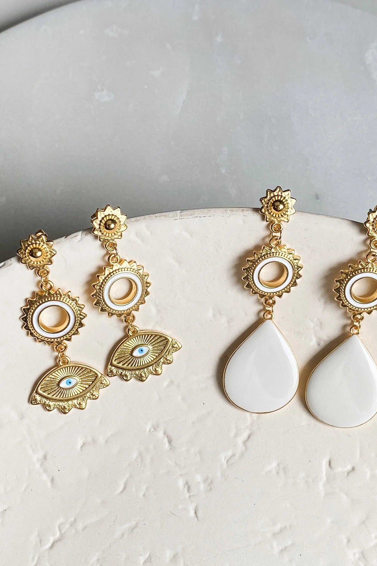 PYTHIA Statement Evil eye earrings in gold-tone metal feature white teardrops, round accents and turquoise eye motifs