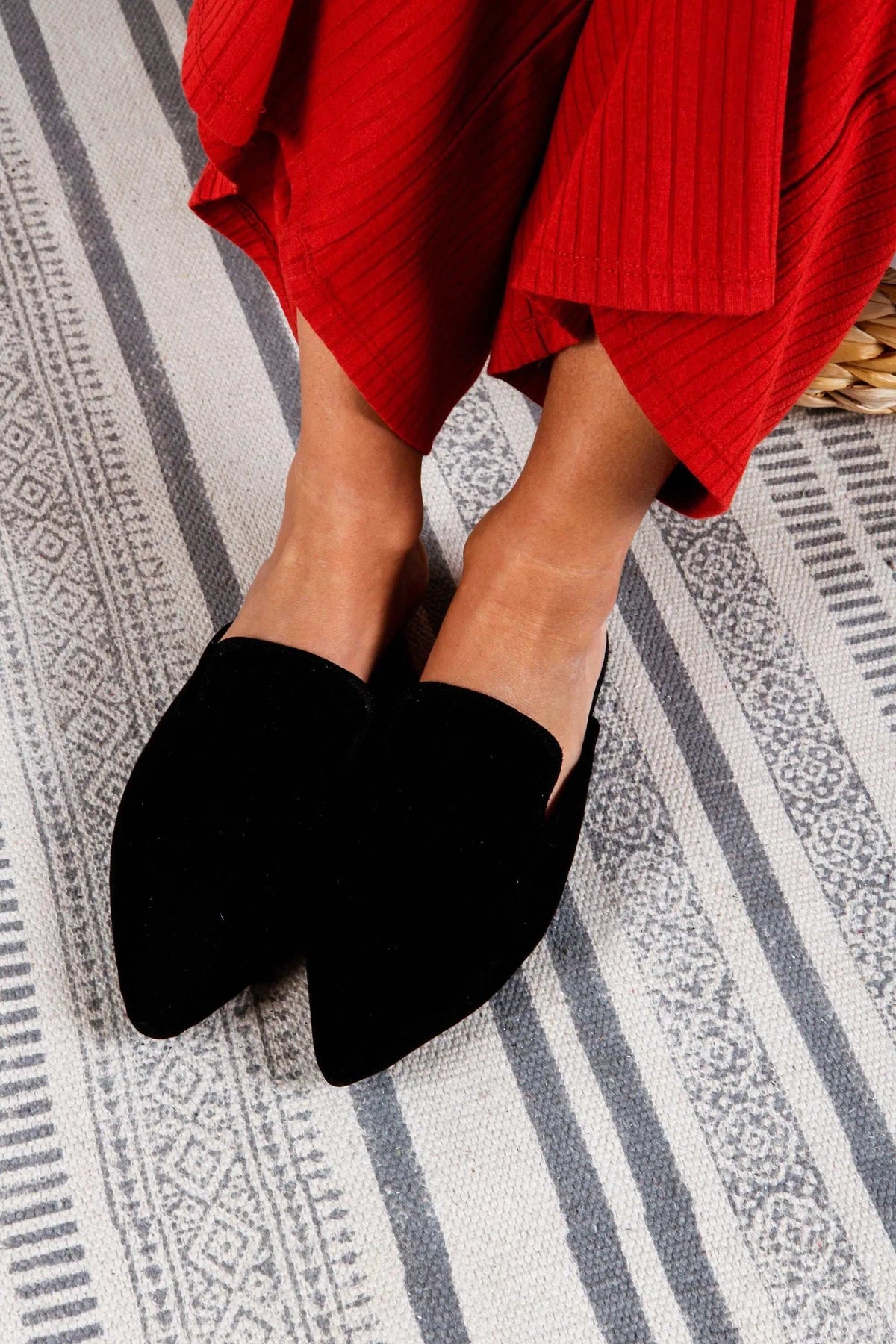 RAFAELA Handmade Greek Sandals are black suede mules with pointed toes and low-cut slip-on uppers